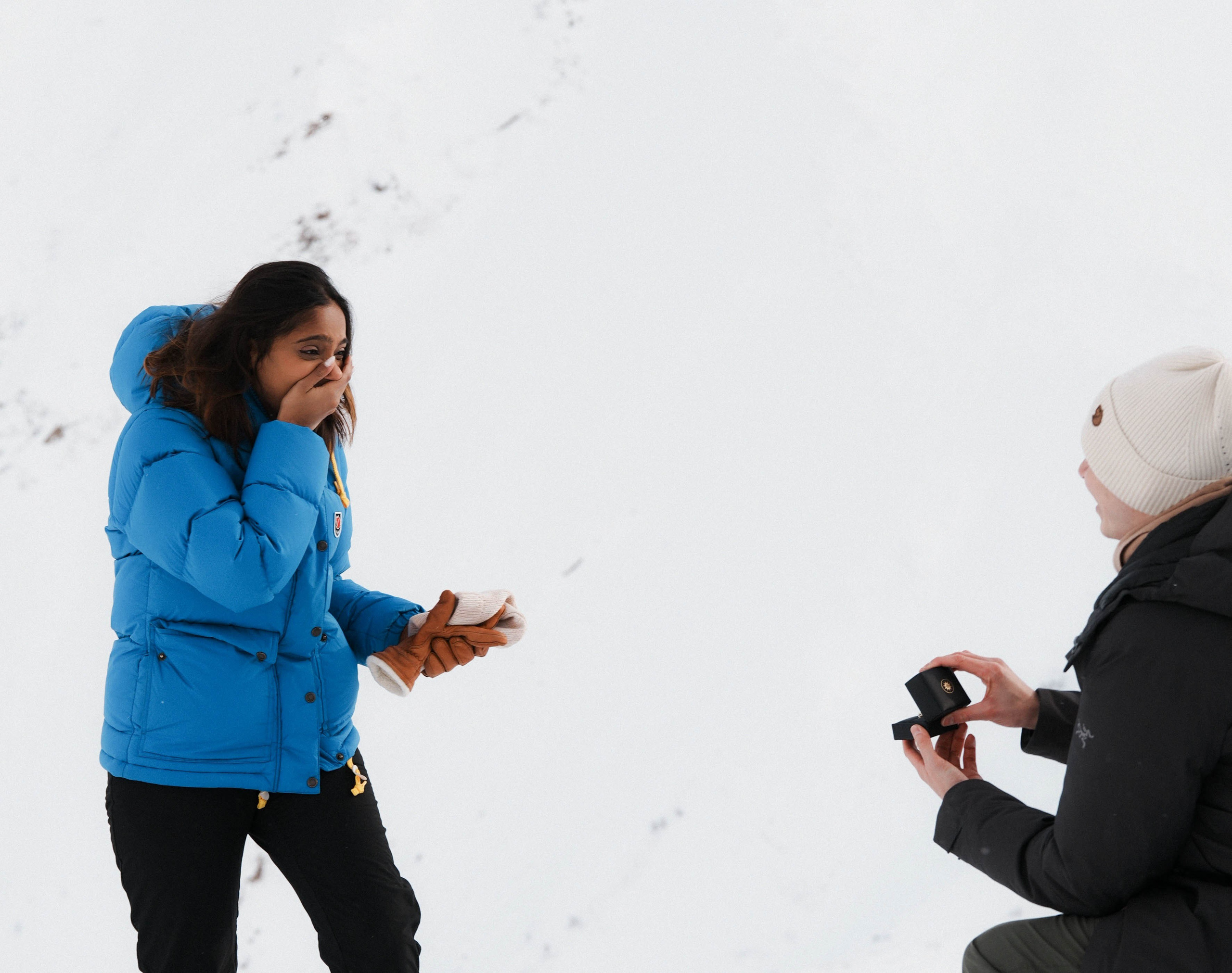 Man proposing in Gudauri mountains during winter