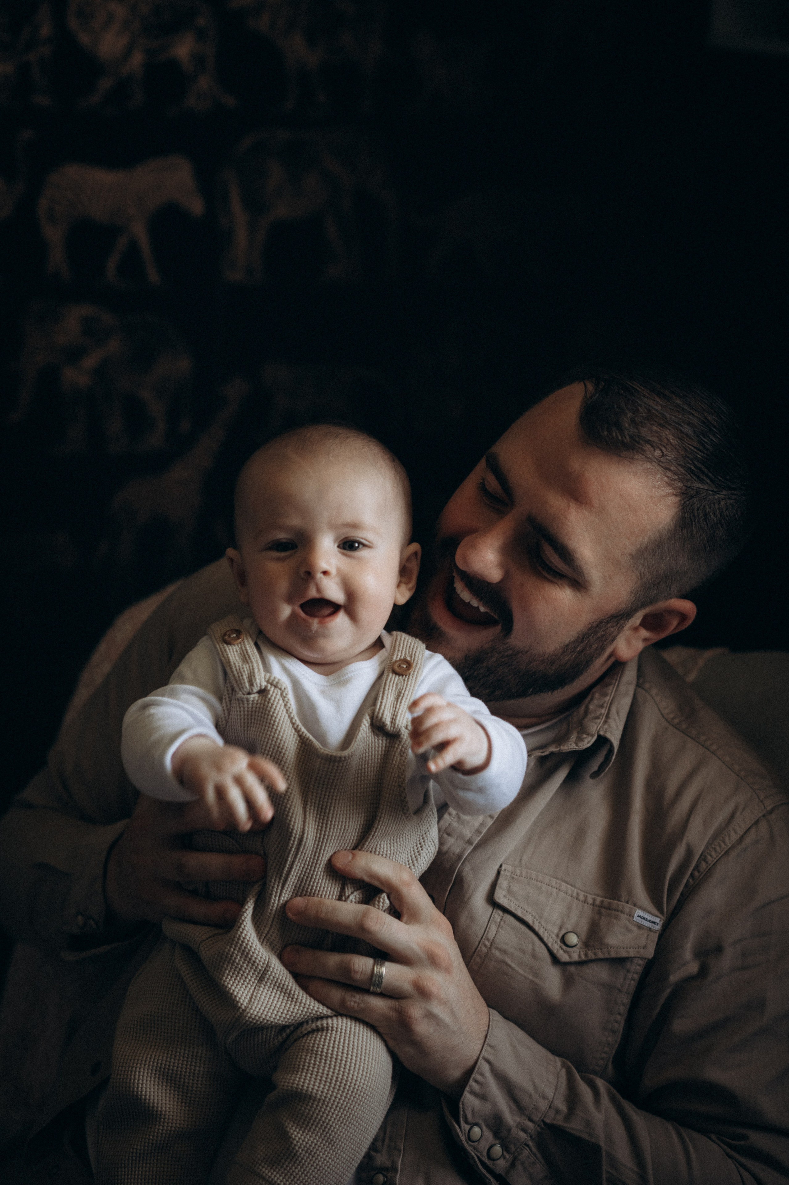 dad with baby at home