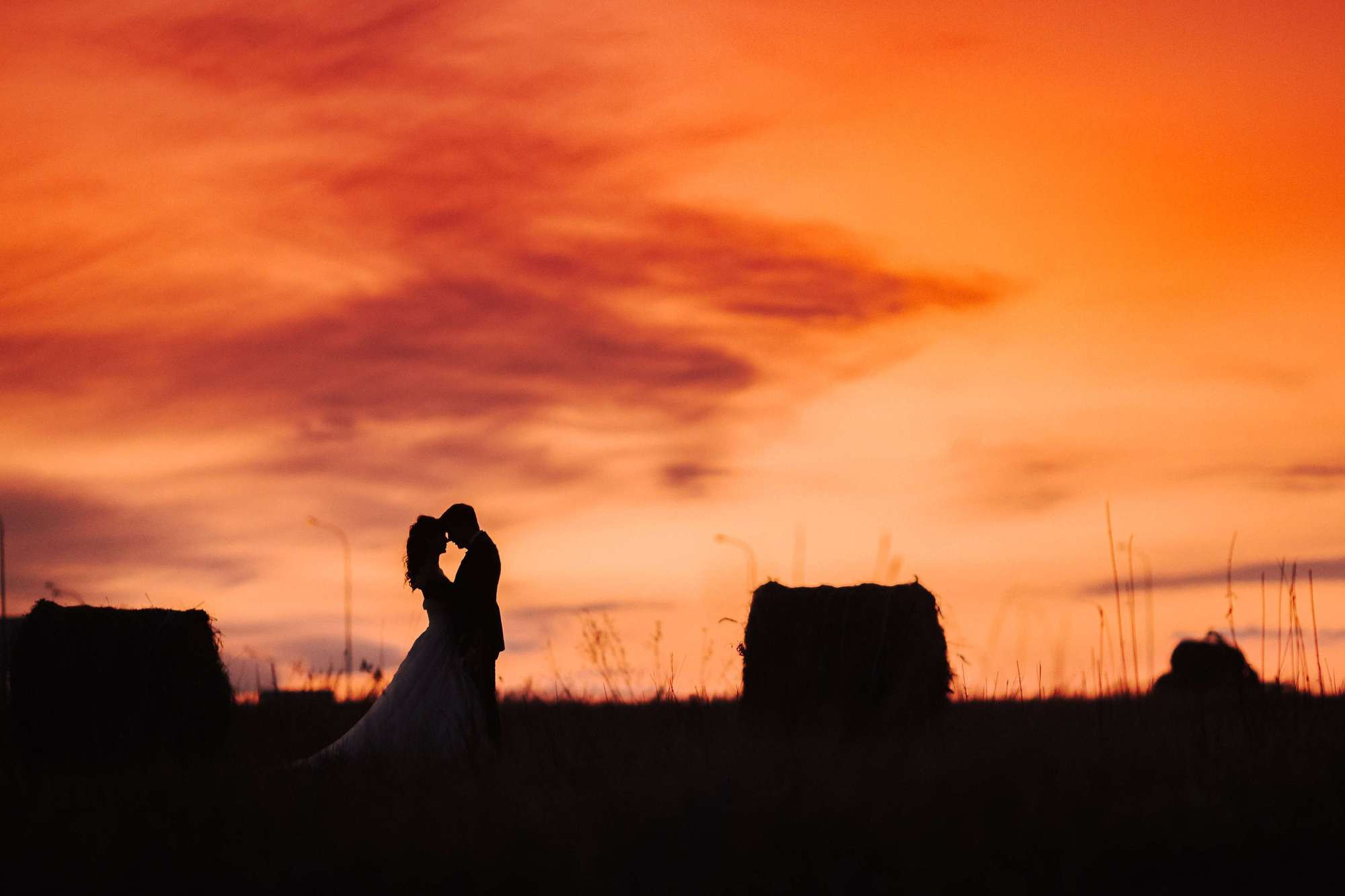 Elopement in Stacks of Hay. Wedding Photography & Videography Team in California, Los Angeles, San Francisco, San Diego and Travel