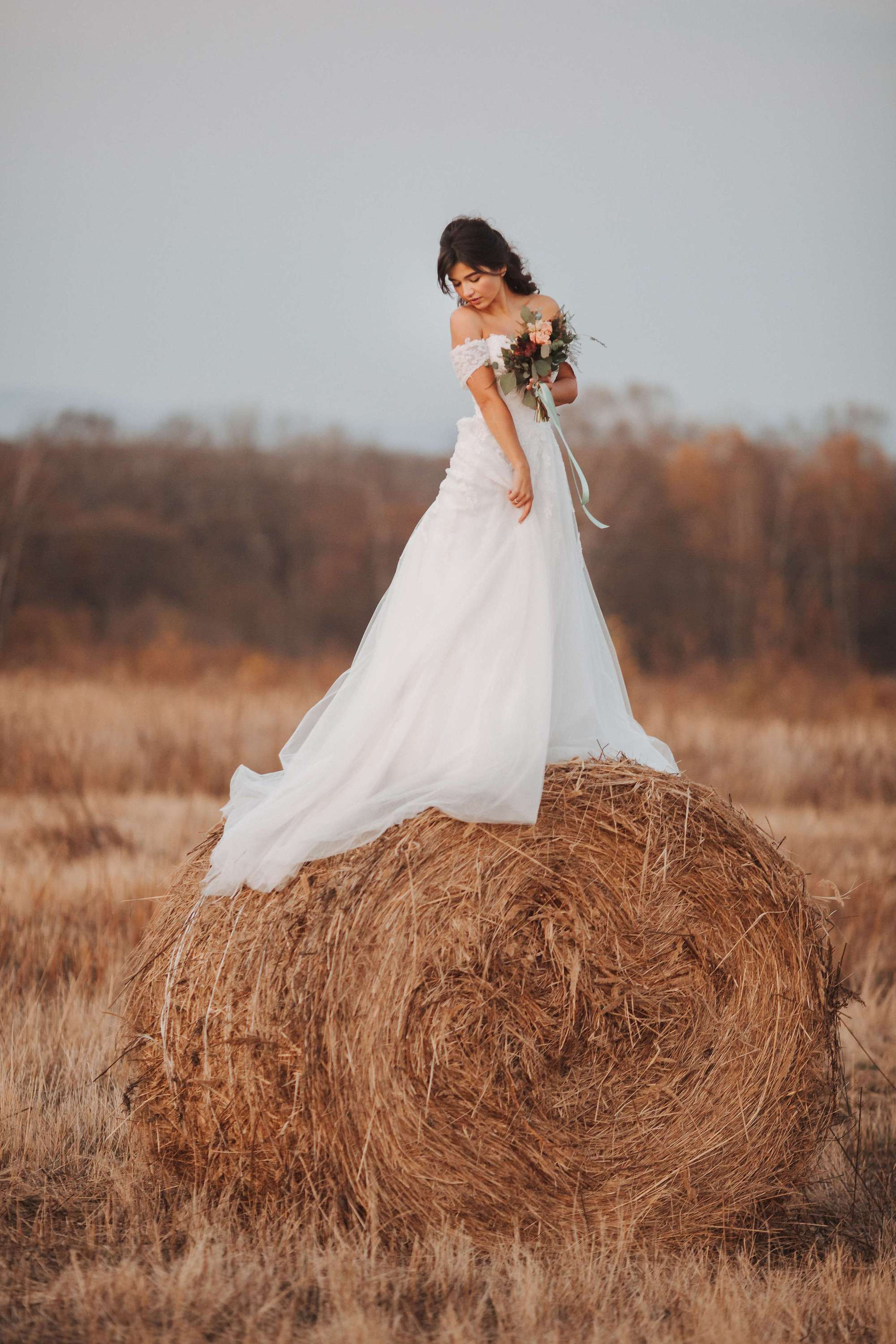 Elopement in Stacks of Hay. Wedding Photography & Videography Team in California, Los Angeles, San Francisco, San Diego and Travel