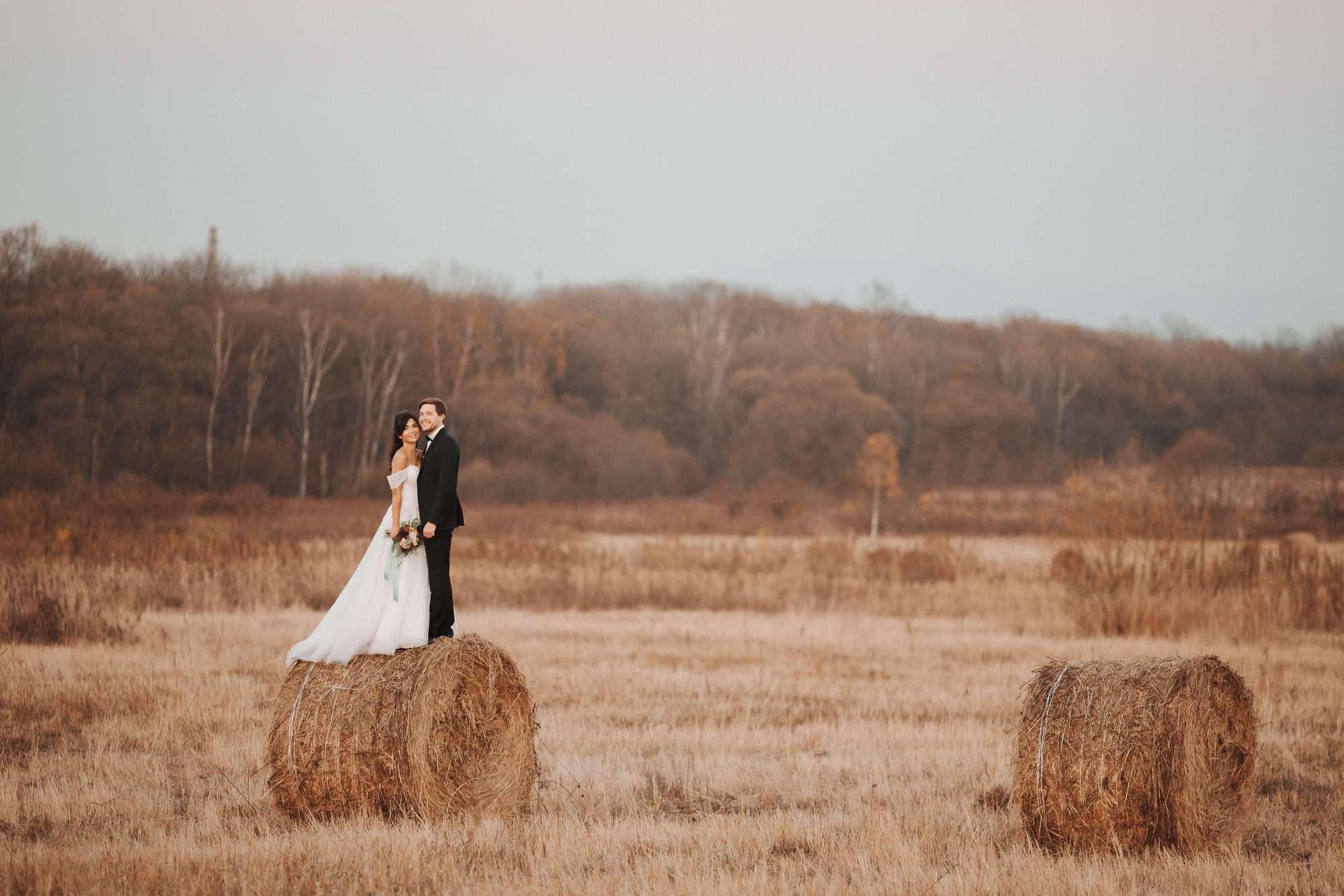 Elopement in Stacks of Hay. Wedding Photography & Videography Team in California, Los Angeles, San Francisco, San Diego and Travel