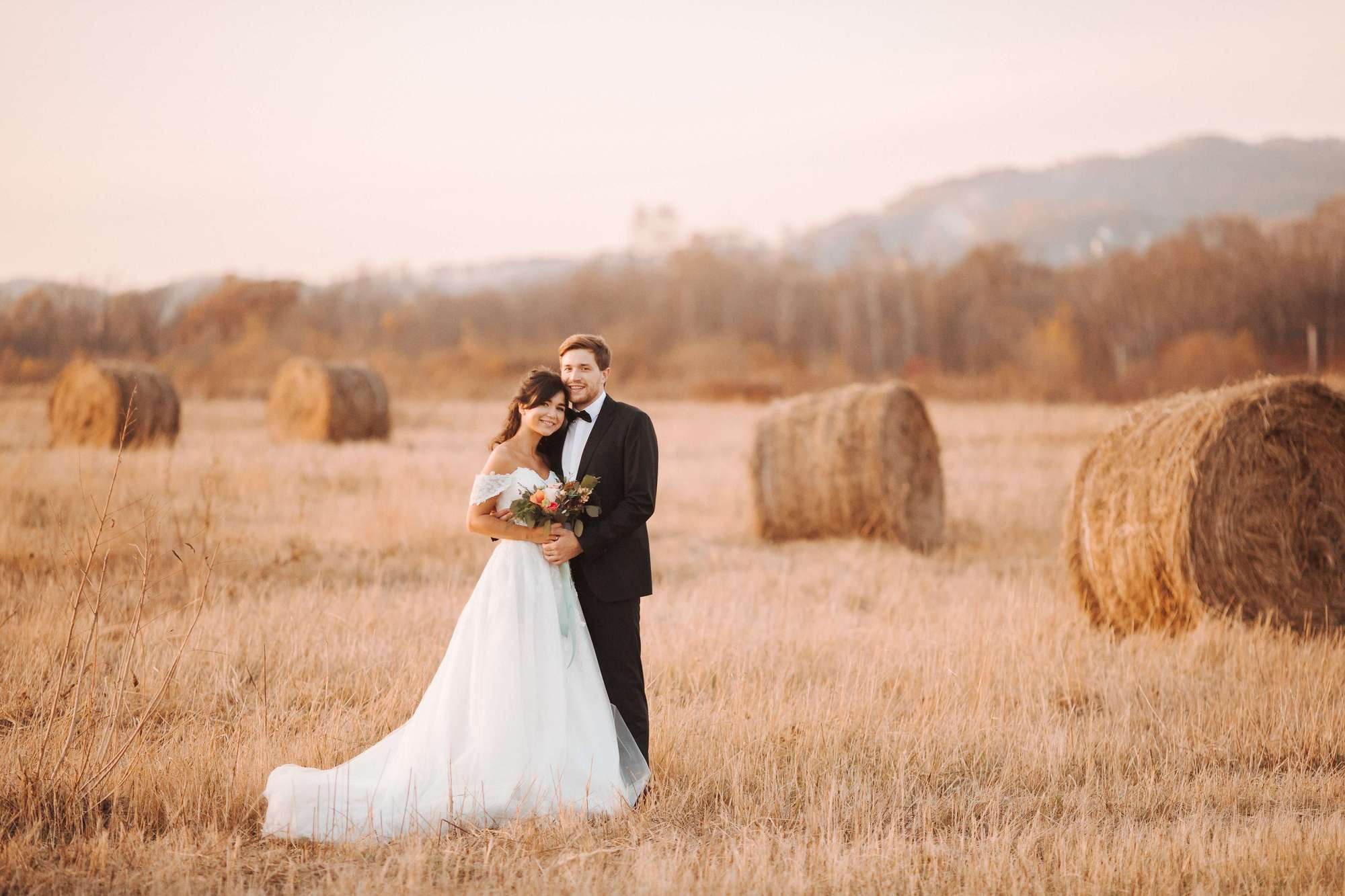 Elopement in Stacks of Hay. Wedding Photography & Videography Team in California, Los Angeles, San Francisco, San Diego and Travel
