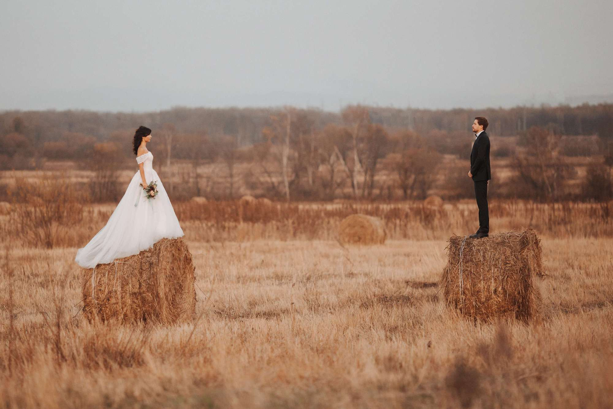 Elopement in Stacks of Hay. Wedding Photography & Videography Team in California, Los Angeles, San Francisco, San Diego and Travel