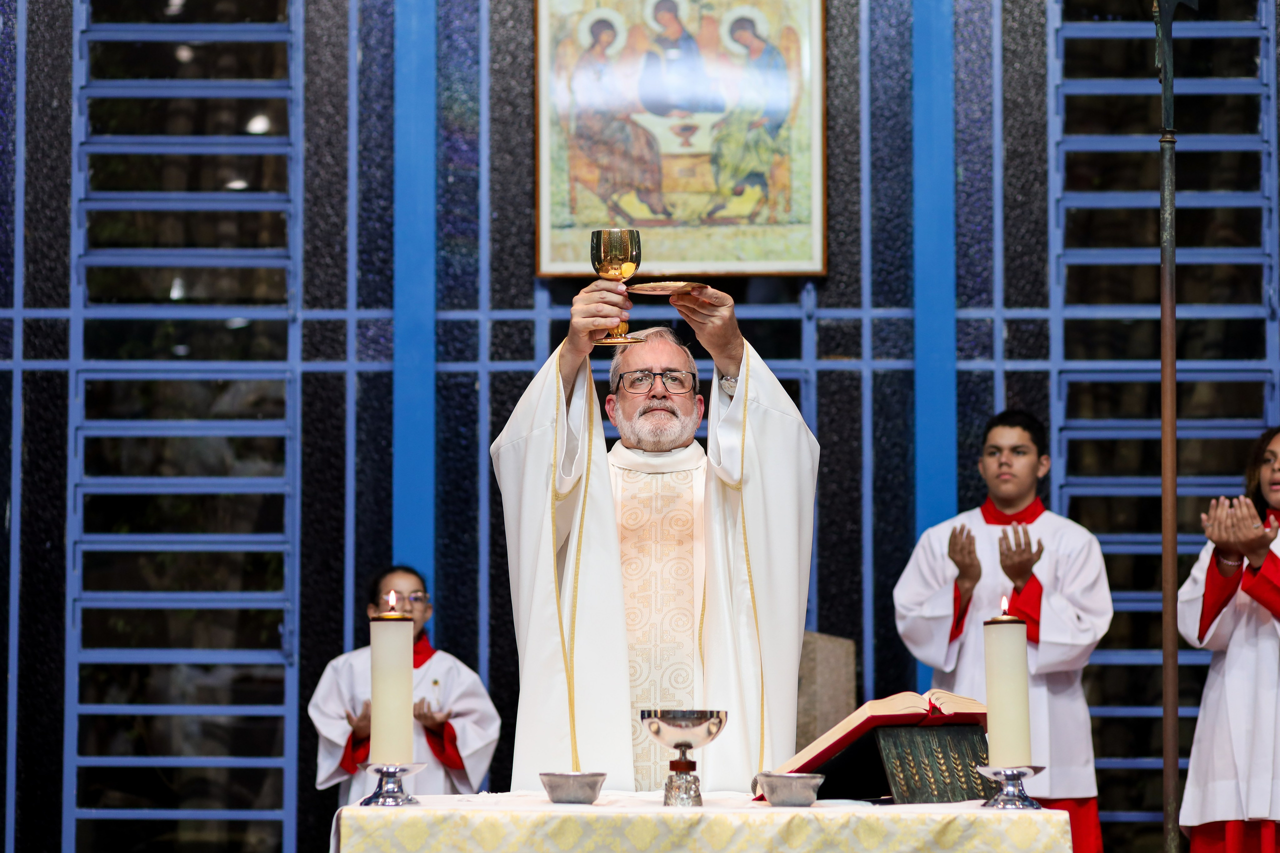 Primeira Eucaristia. Fotógrafo de momentos Sagrados