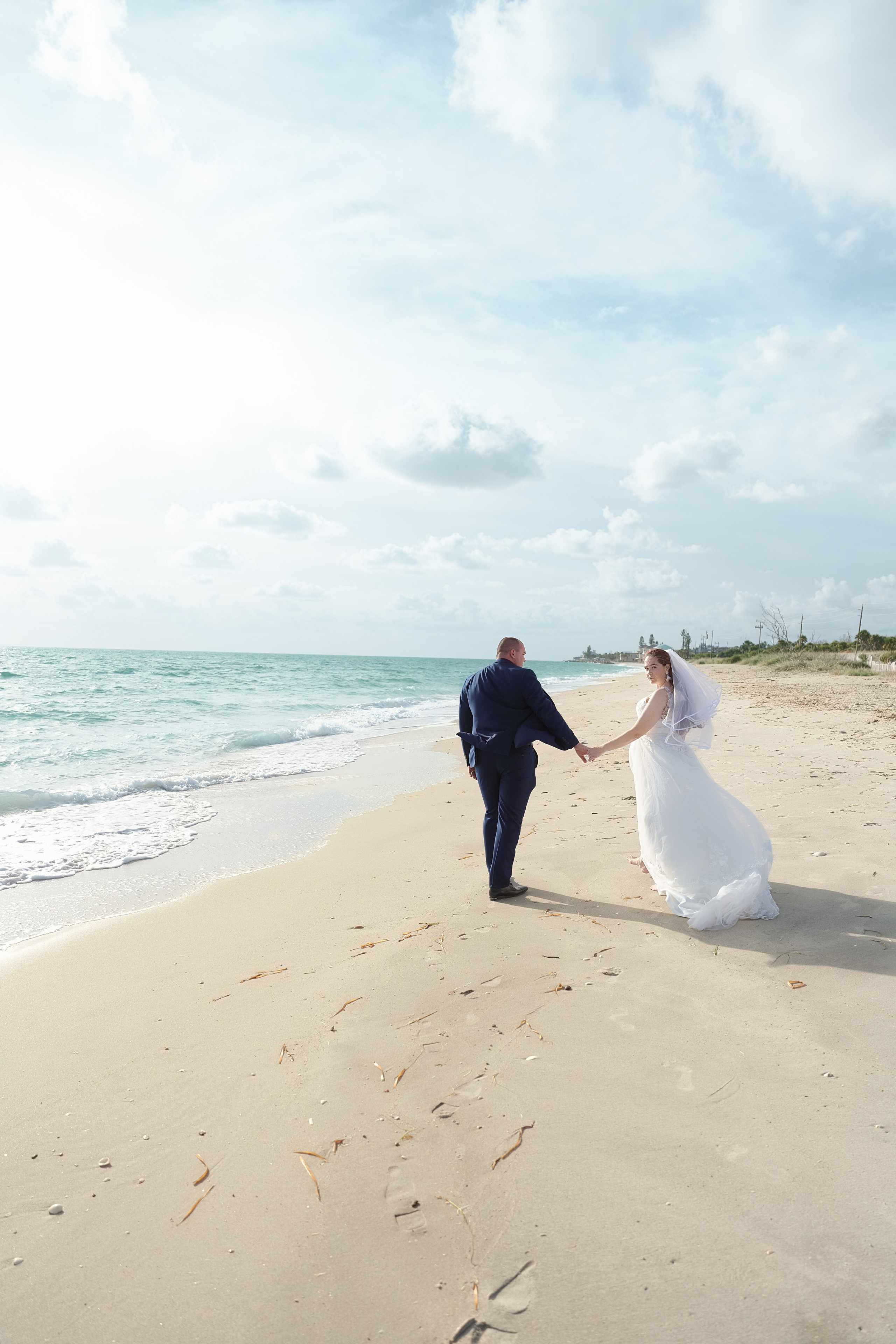Beach Wedding in Englewood, Florida. Wedding and family photographer Olga Belianskaia
