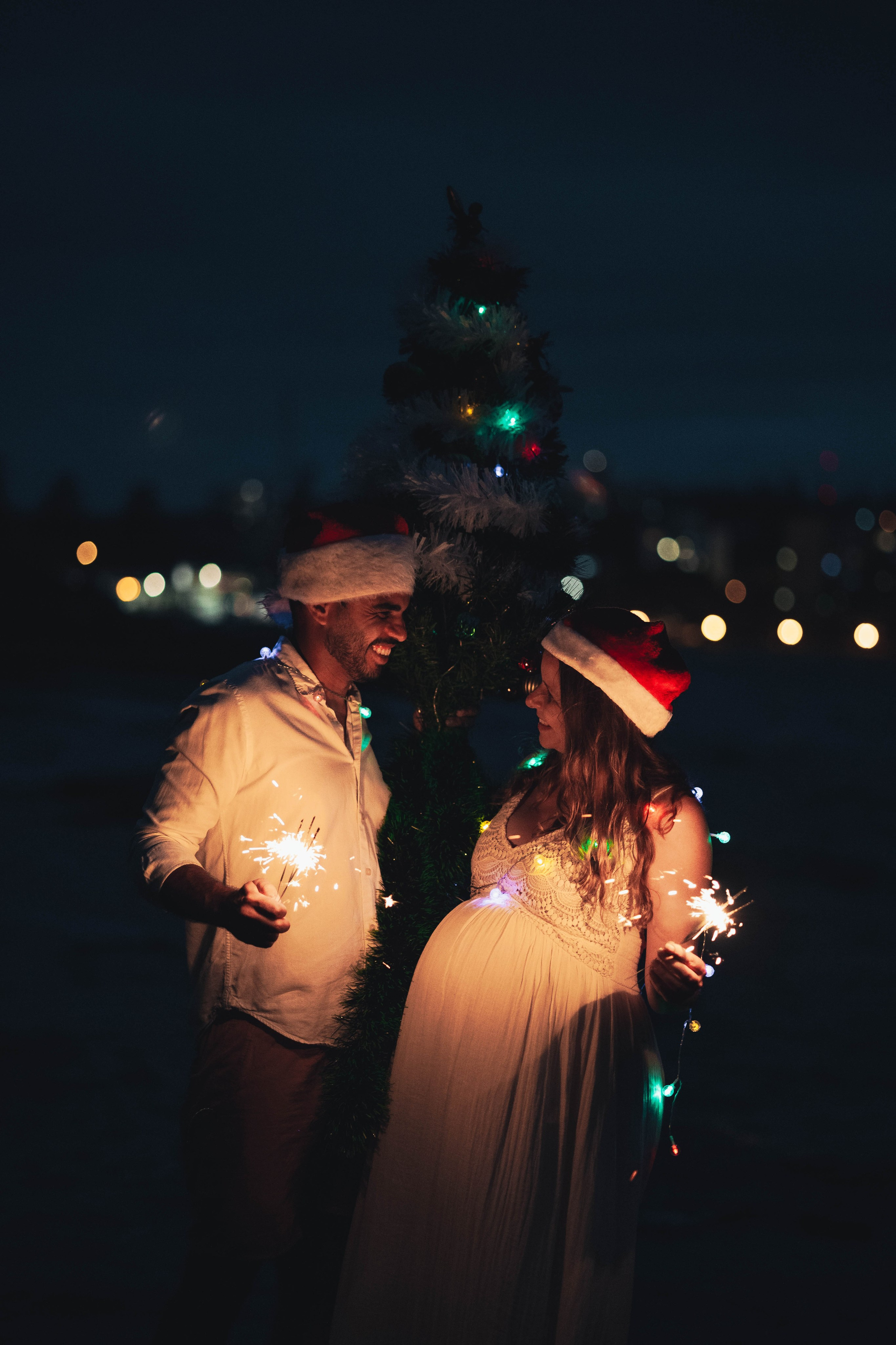 Heather + Tulio + Pregnant + Christmas. True Story Photography