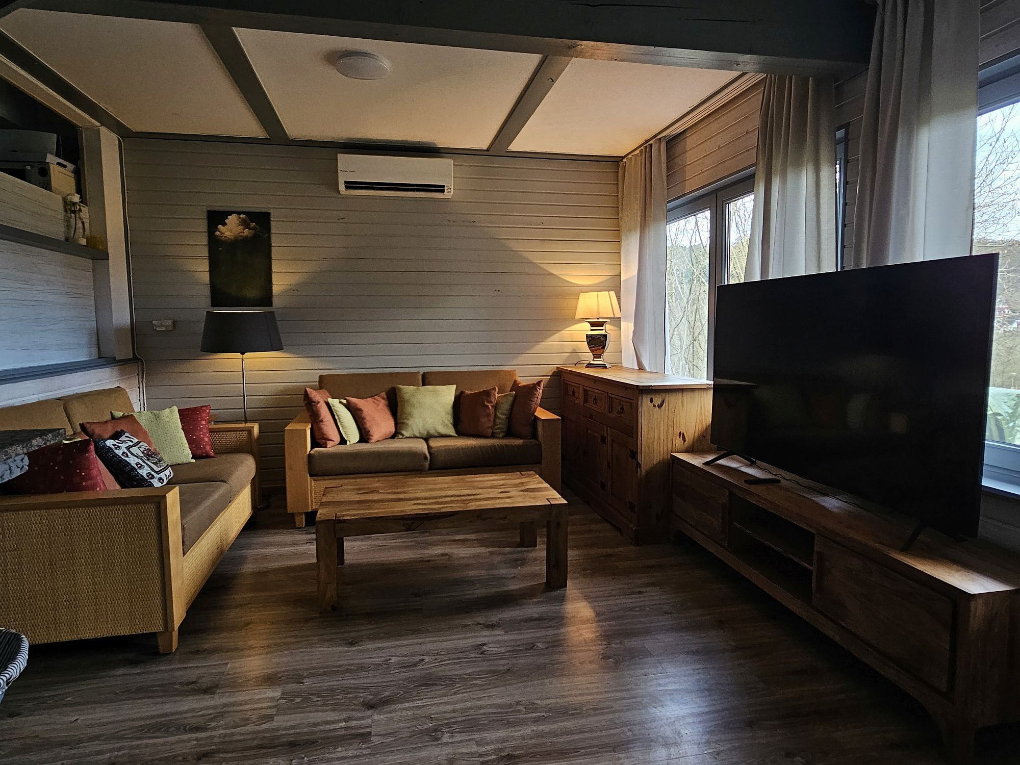 Wohnzimmer, TV-Lounge, Kamin  im Ferienhaus 102