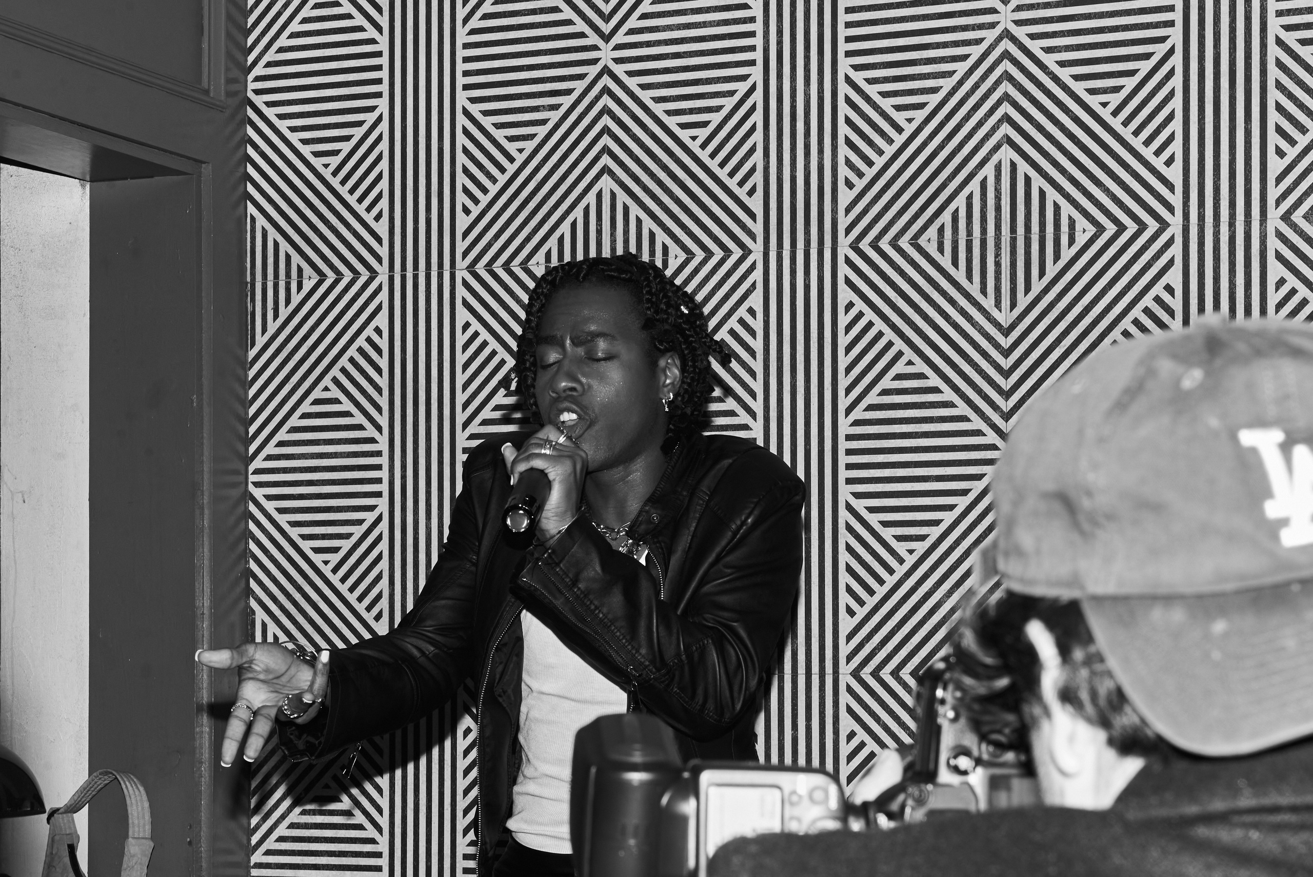 Alik Bulan sings in a bar