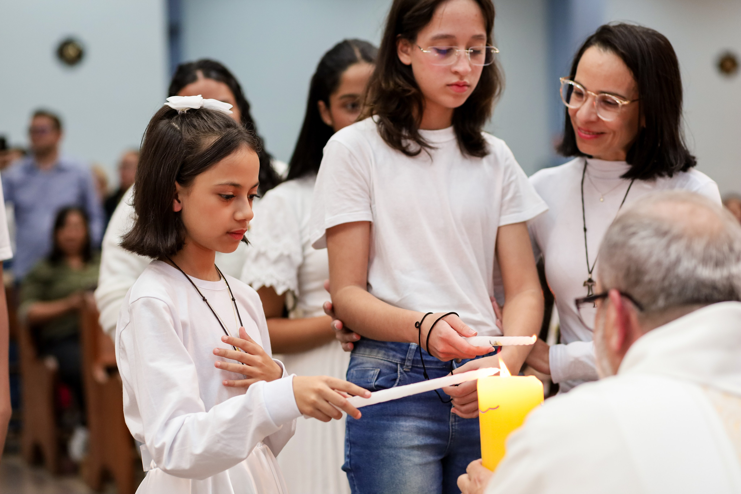 Primeira Eucaristia. Fotógrafo de momentos Sagrados