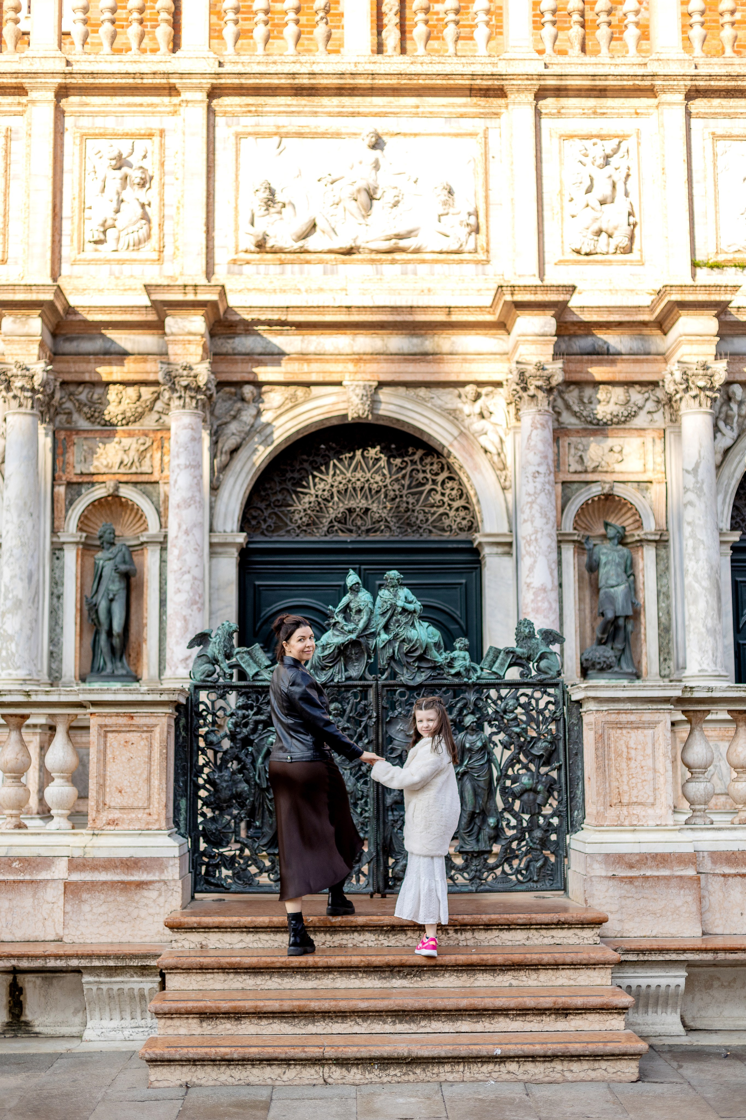 Mother and daughter at sunrise