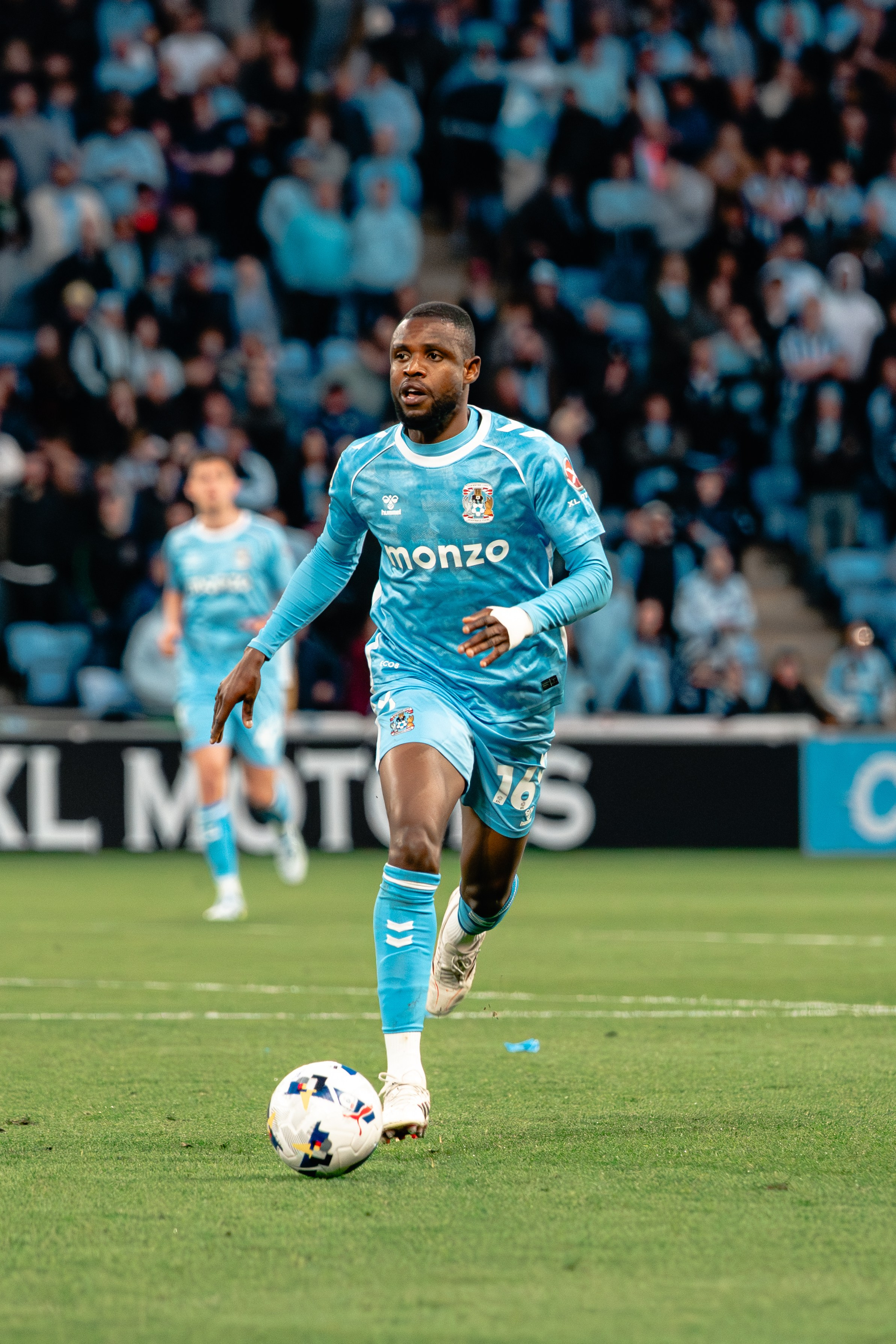 Coventry City player carrying the ball during the Championship match against Portsmouth