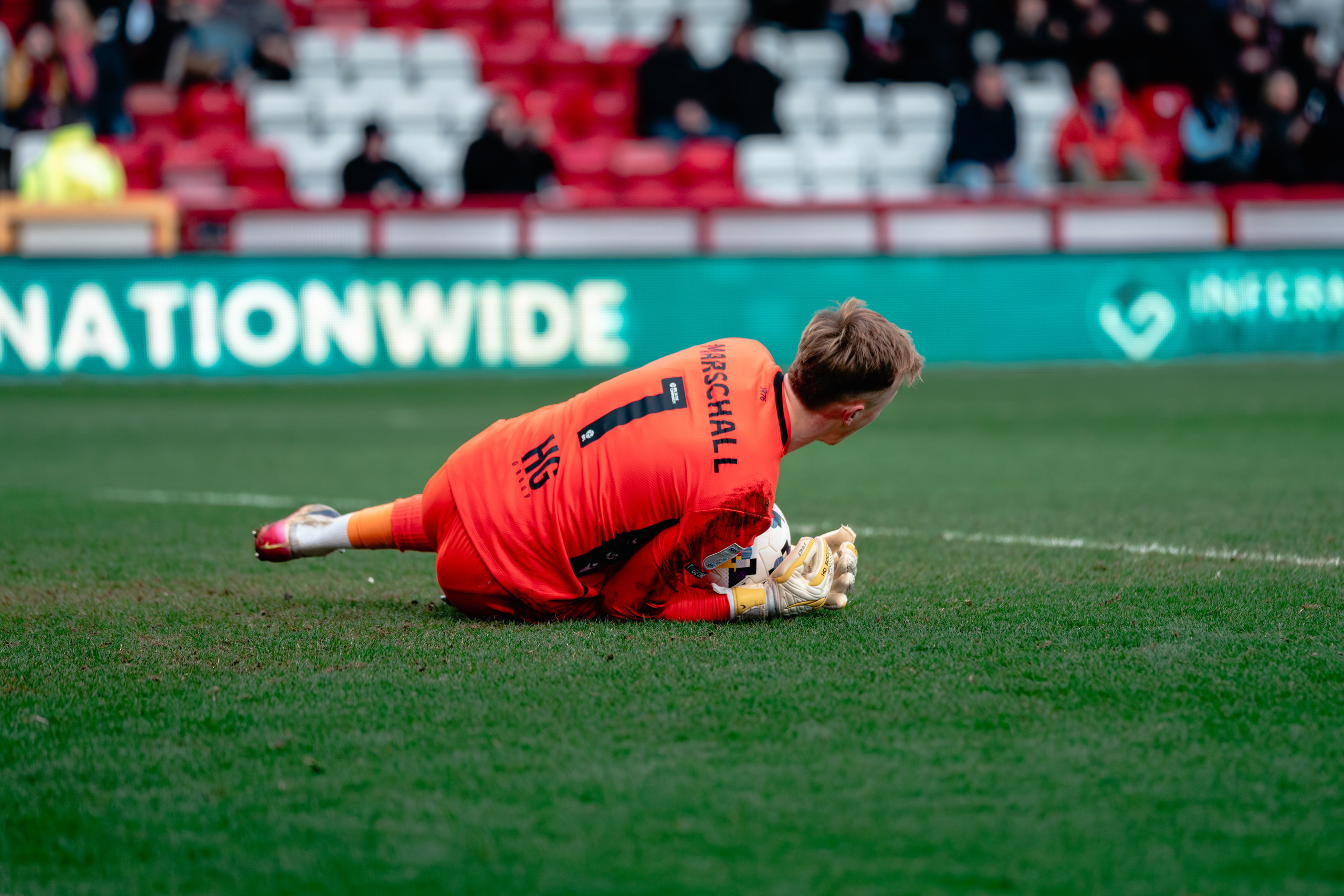 Stevenage player on the ground following a challenge during the League One match against Stockport County.