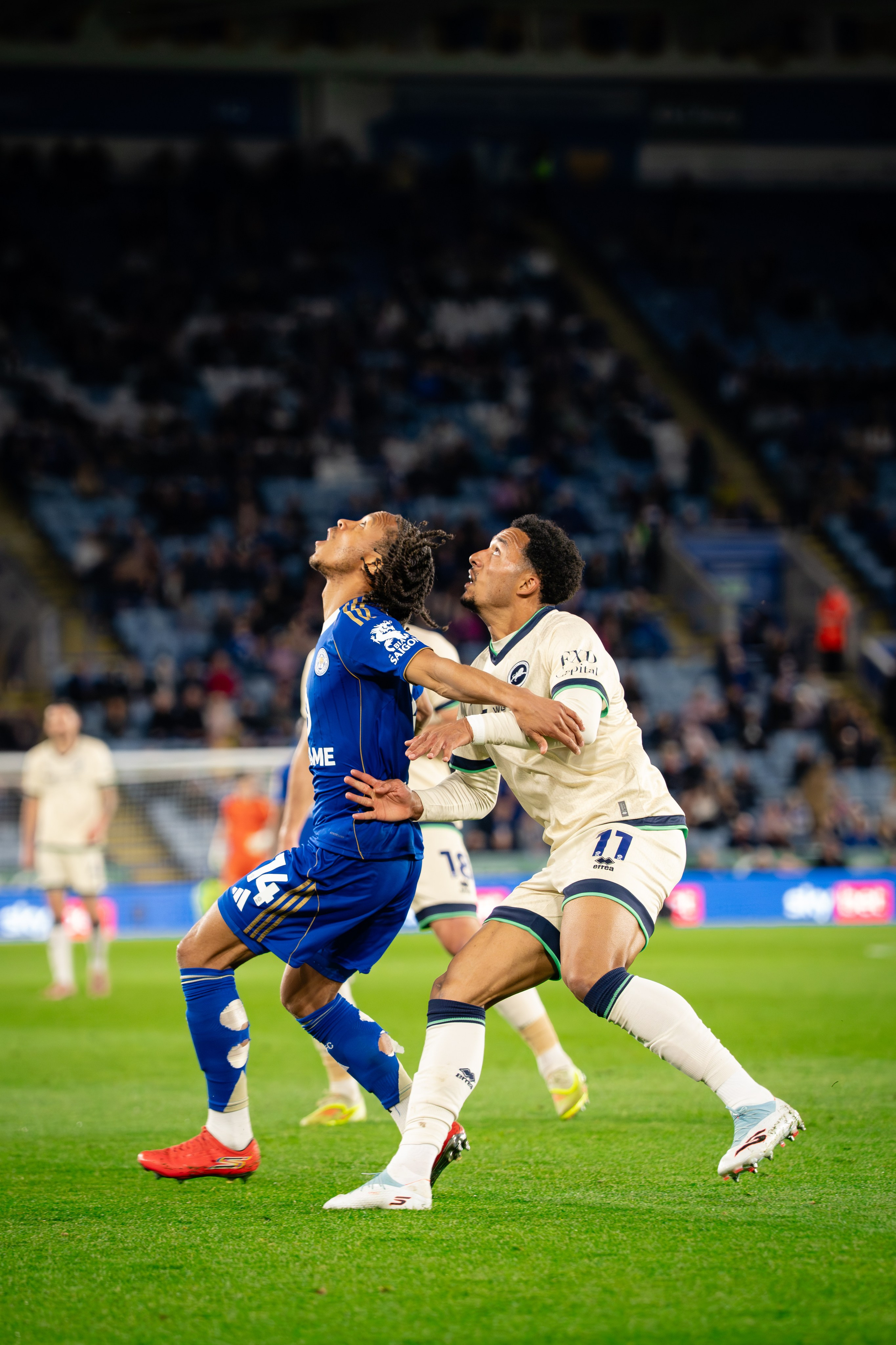Leicester City and Millwall players battling for possession during the Championship match on 24 April 2026.
