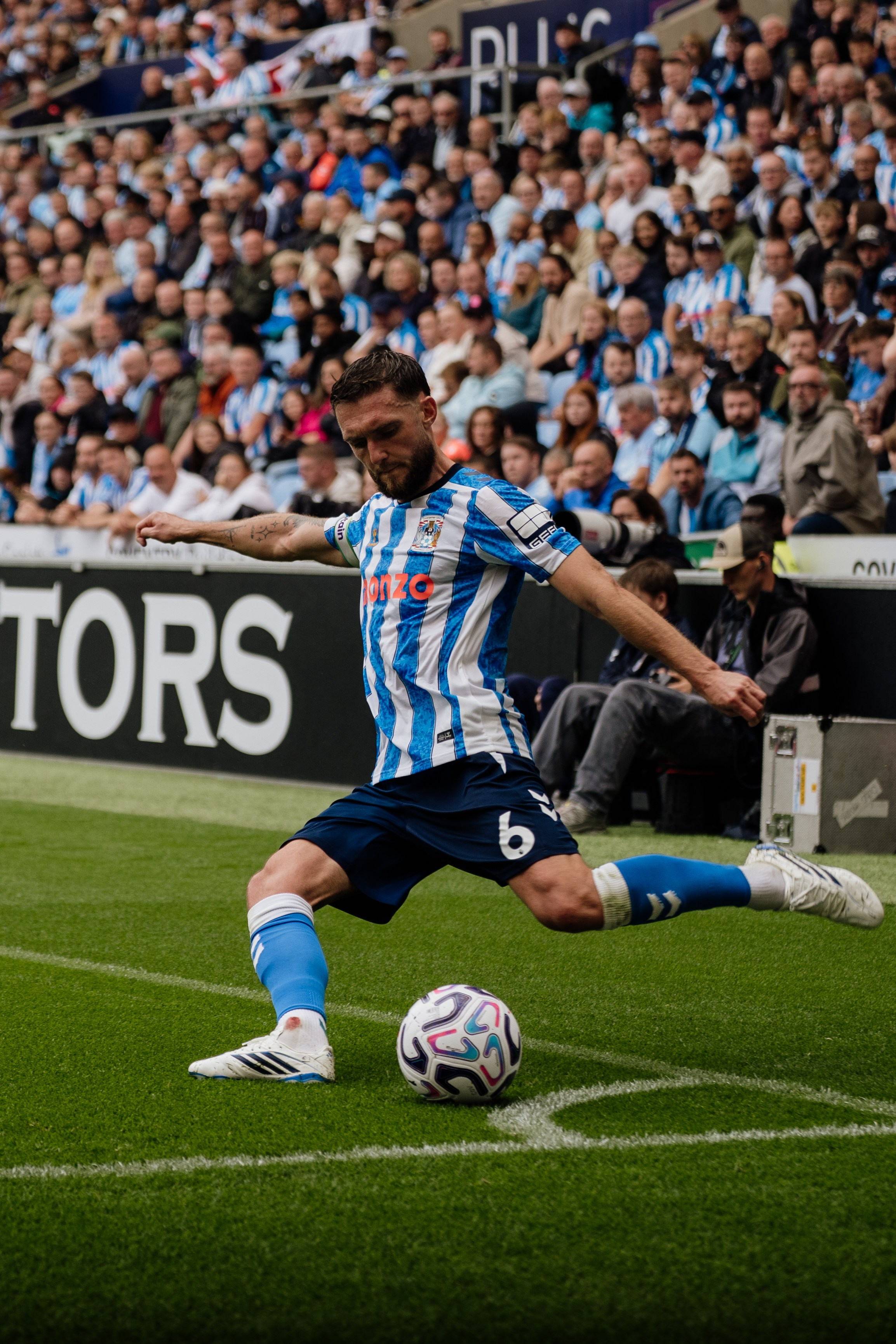 Coventry City player dribbling with the ball during the Premier League match against Hull City