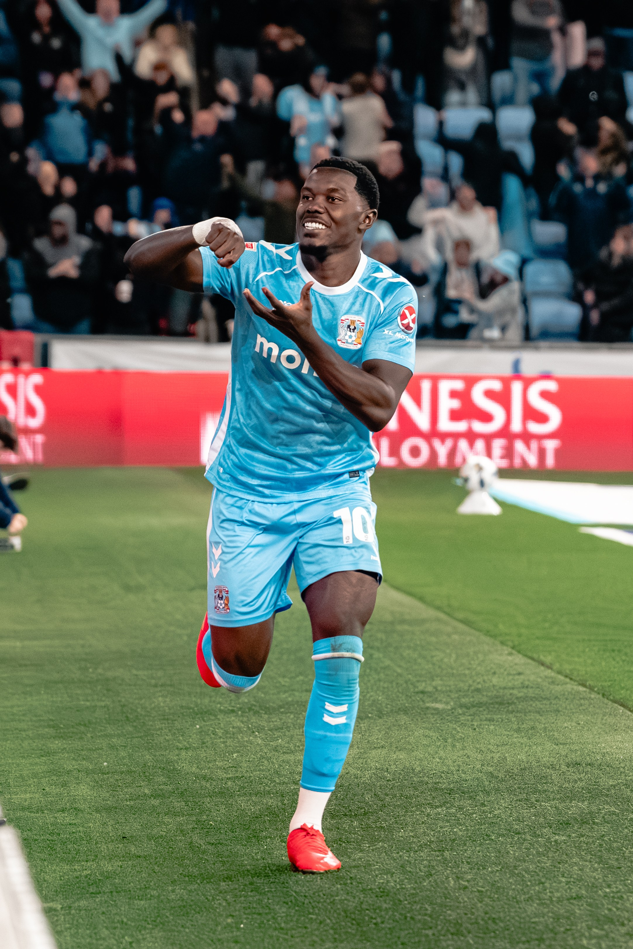 Coventry City player celebrating during the 5–1 Championship win over Portsmouth