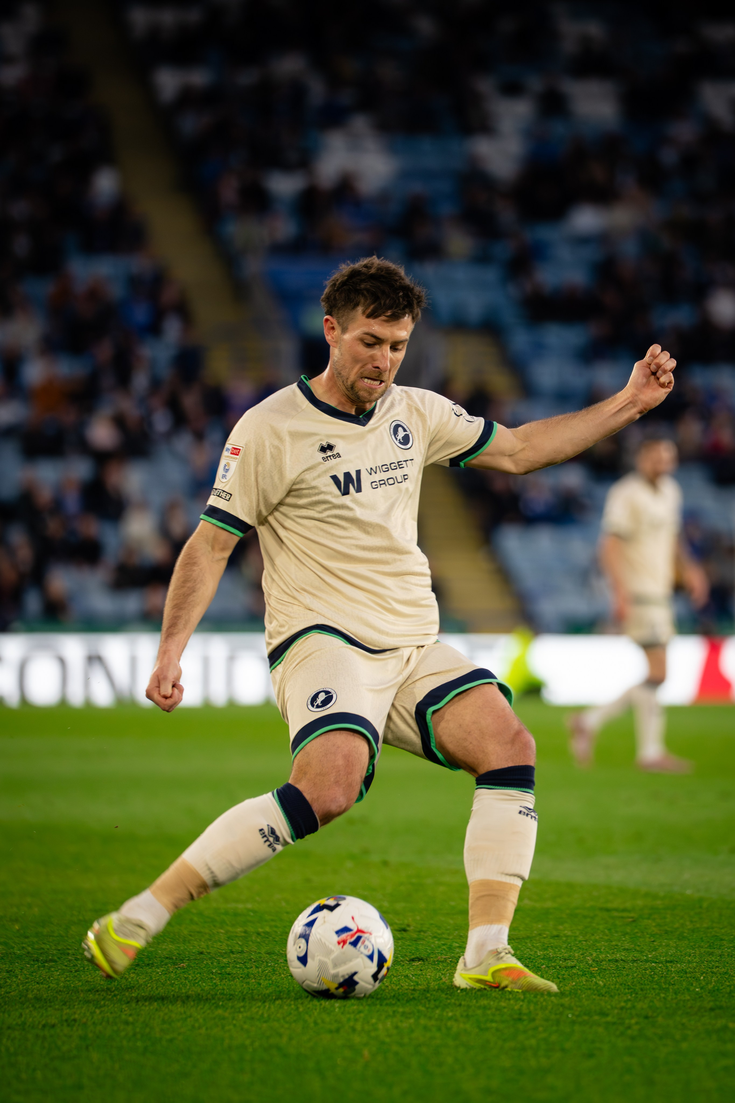 Millwall player striking the ball during the Championship fixture against Leicester City at the King Power Stadium