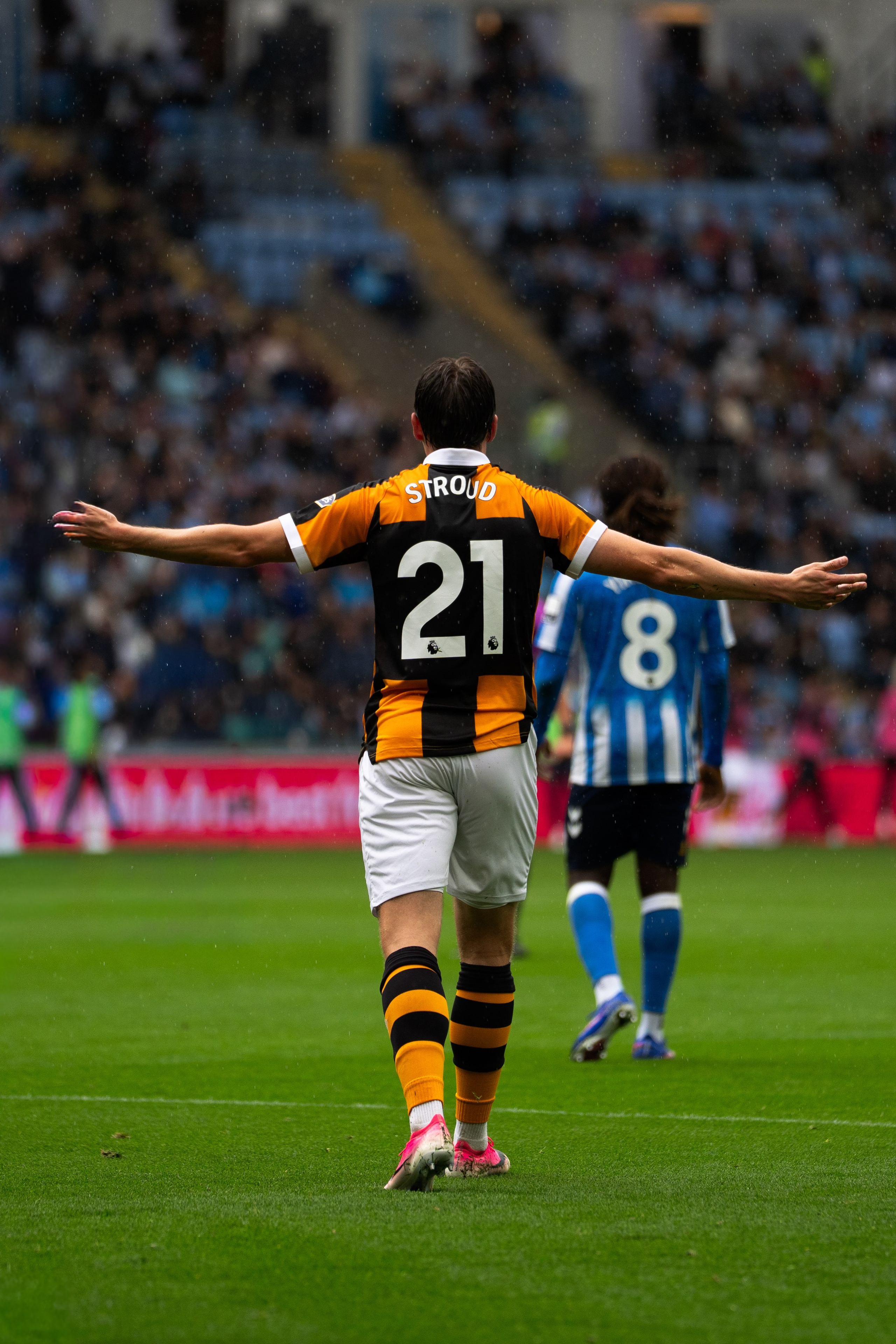 Hull City player wearing number 21 reacting during the Premier League match against Coventry City at the Coventry Building Society Arena