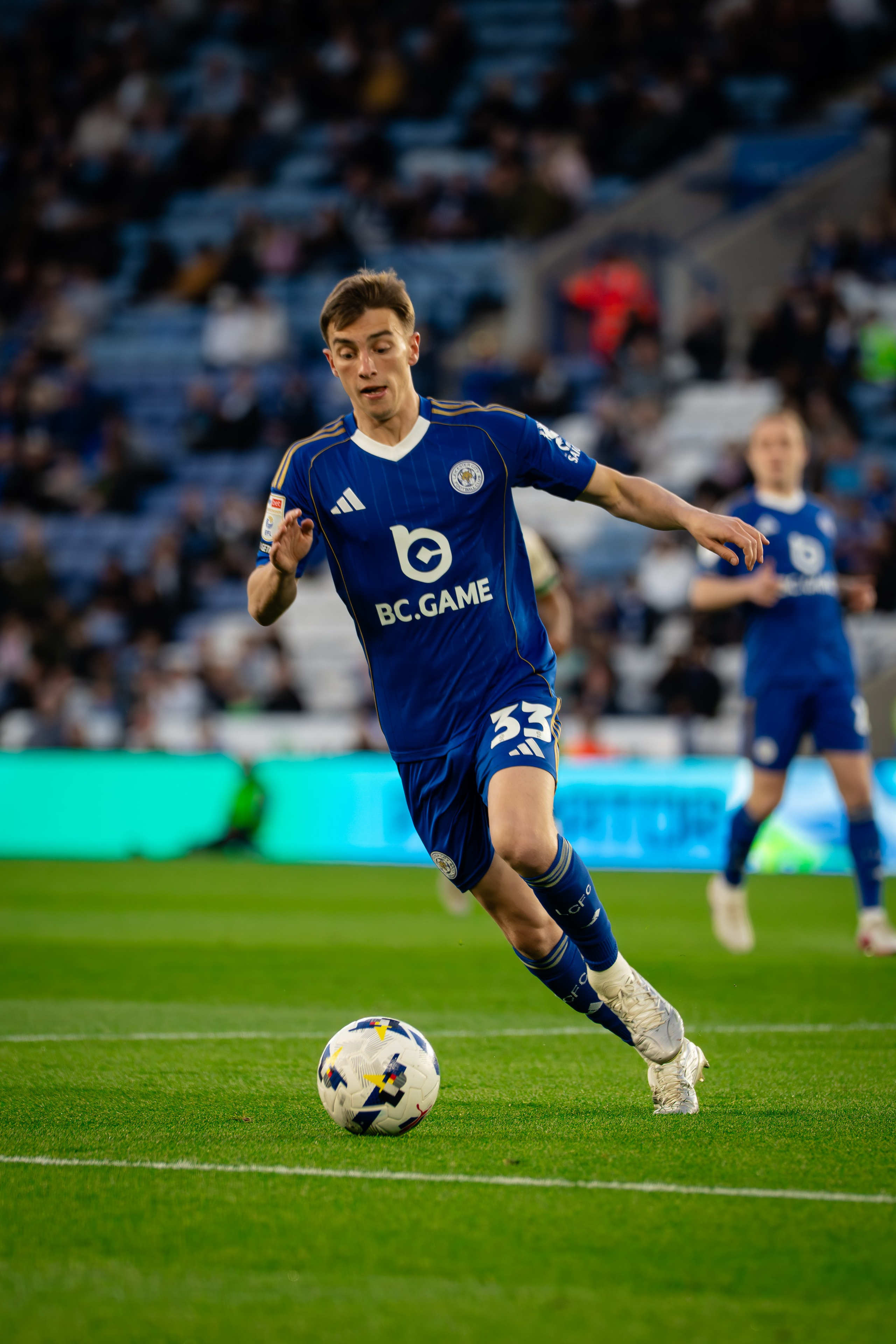 Leicester City player carrying the ball during the Championship fixture against Millwall.
