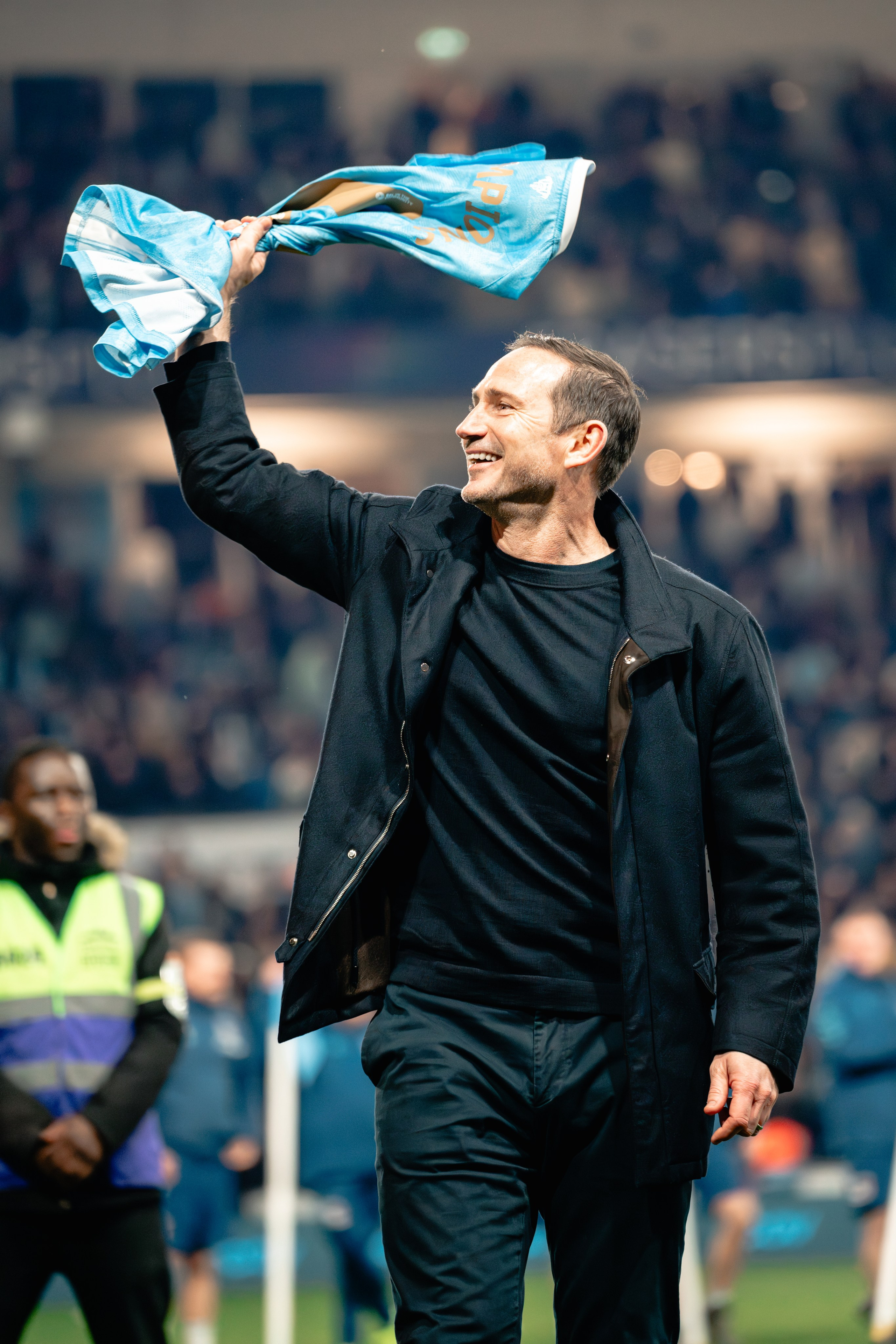 Coventry City manager Frank Lampard acknowledging supporters from the touchline during a professional football match.