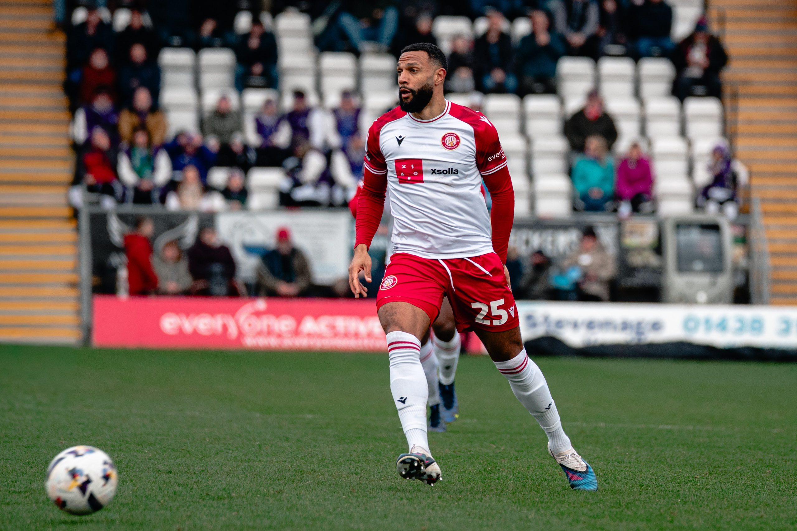 Stevenage player carrying the ball during the 2–1 League One win over Stockport County.