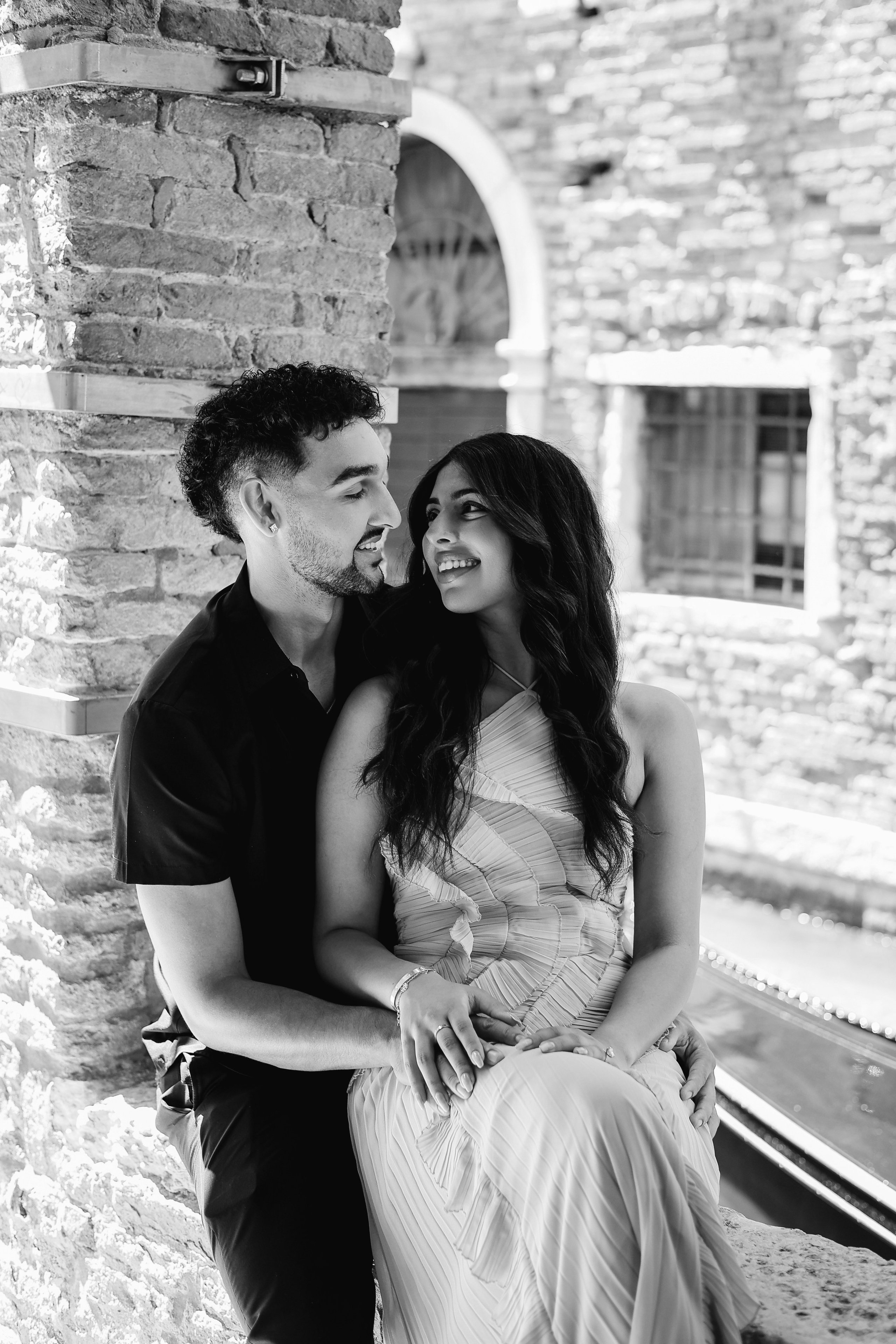 Elegant couple portrait in Venice canals