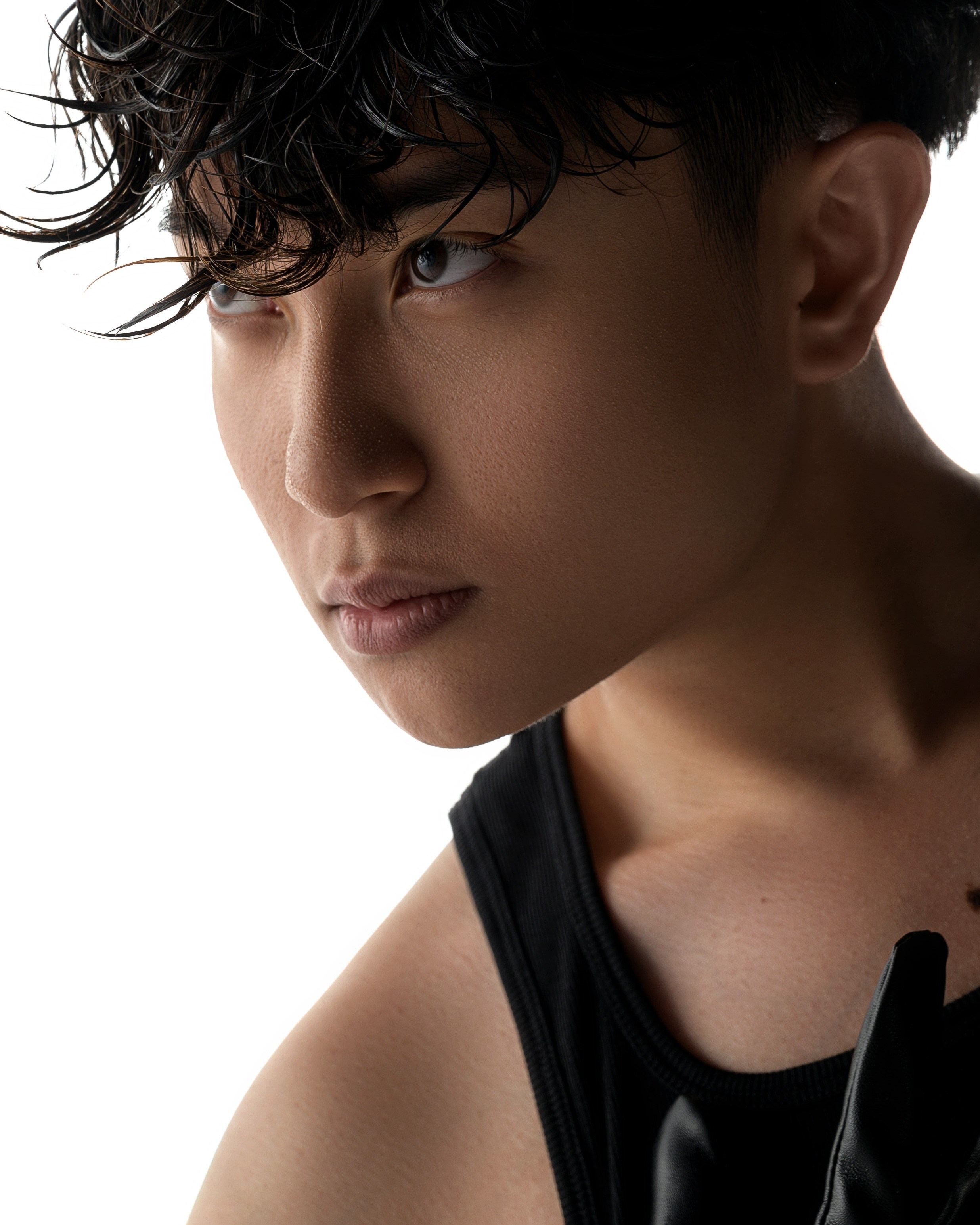 Fashion male portrait in studio with hard light, model test for professional portfolio in San Francisco.