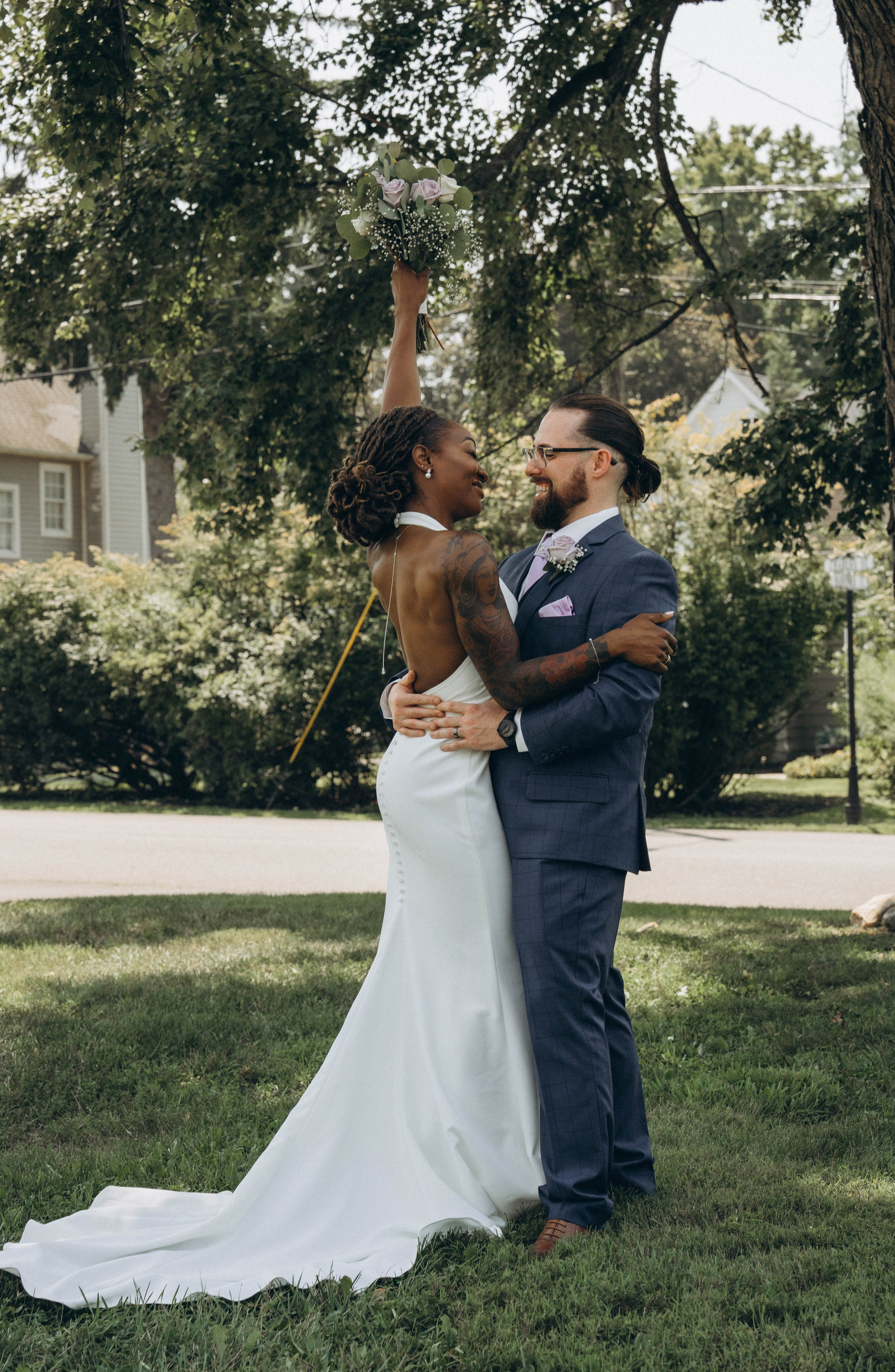 Elegant editorial-style wedding portrait of bride in classic white dress