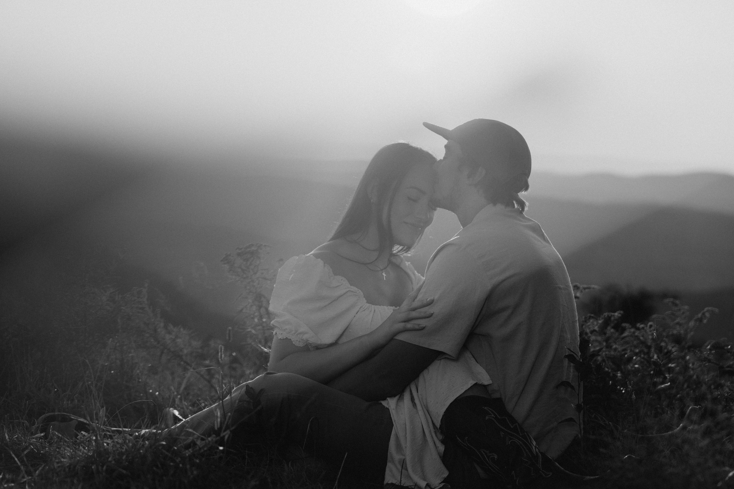 Romantic moment between couple sunset photo shot in Saratoga Springs New York