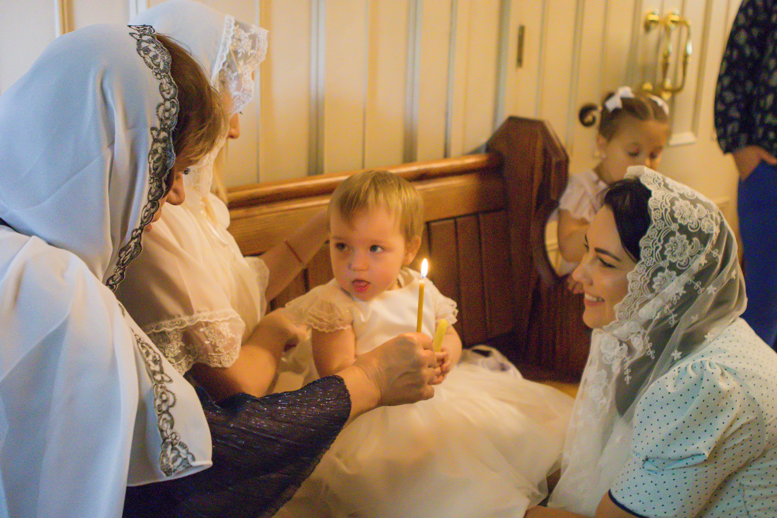 The sacrament of Milana Christening. Photographer Margarita Antonova in Naas, Co Kildare