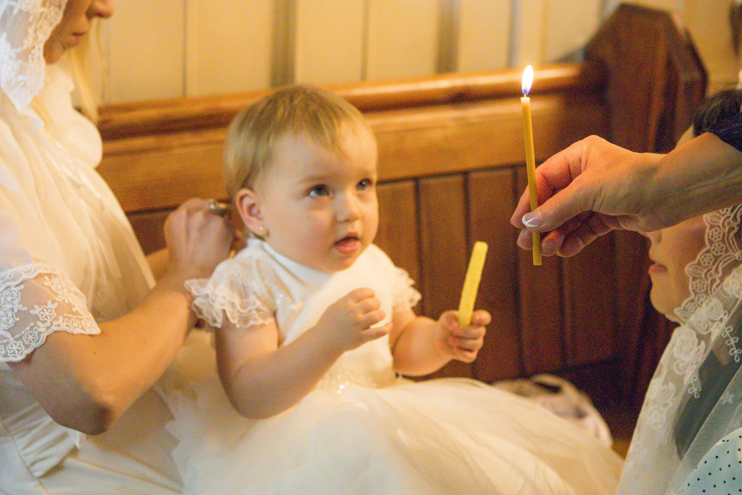 The sacrament of Milana Christening. Photographer Margarita Antonova in Naas, Co Kildare