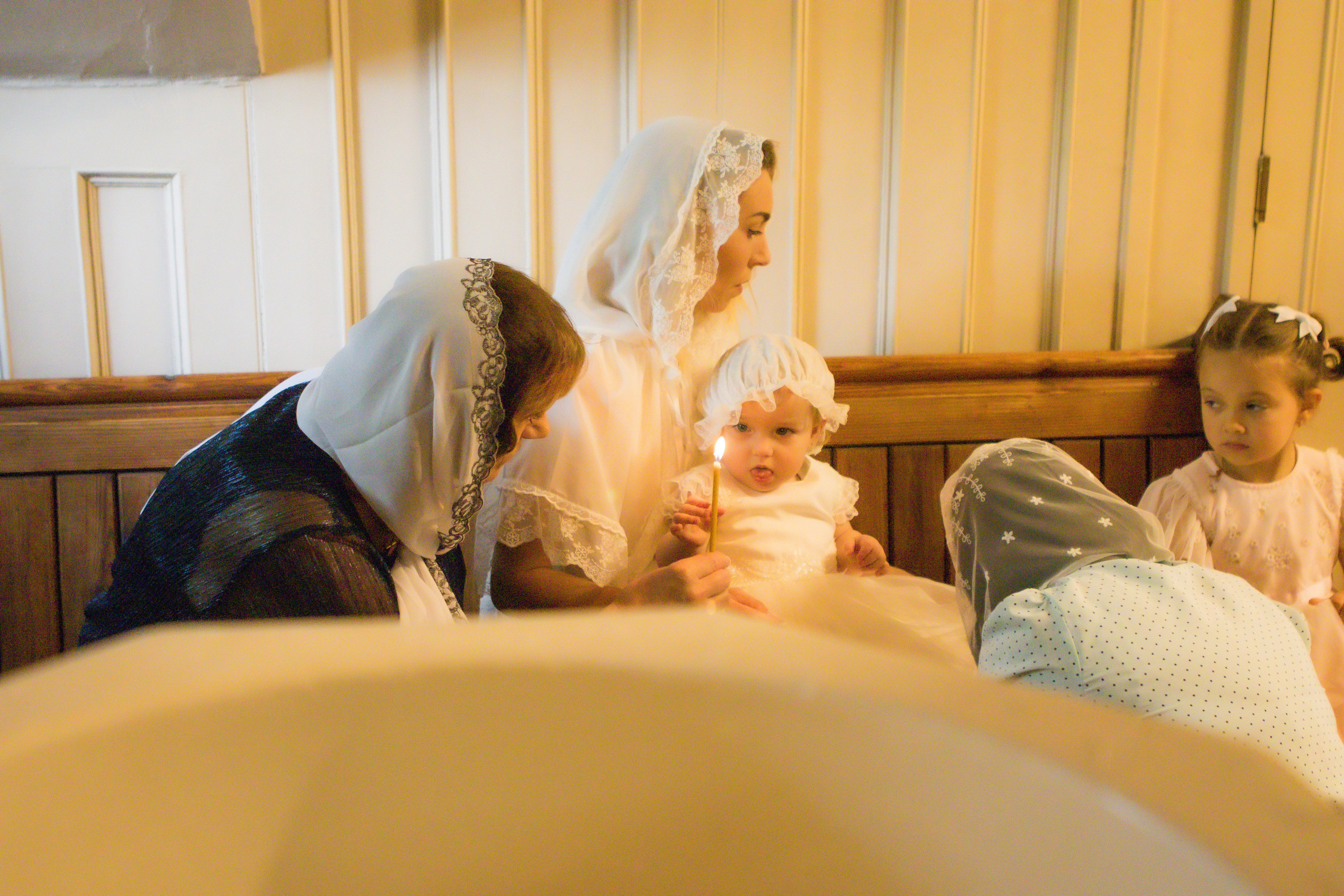 The sacrament of Milana Christening. Photographer Margarita Antonova in Naas, Co Kildare