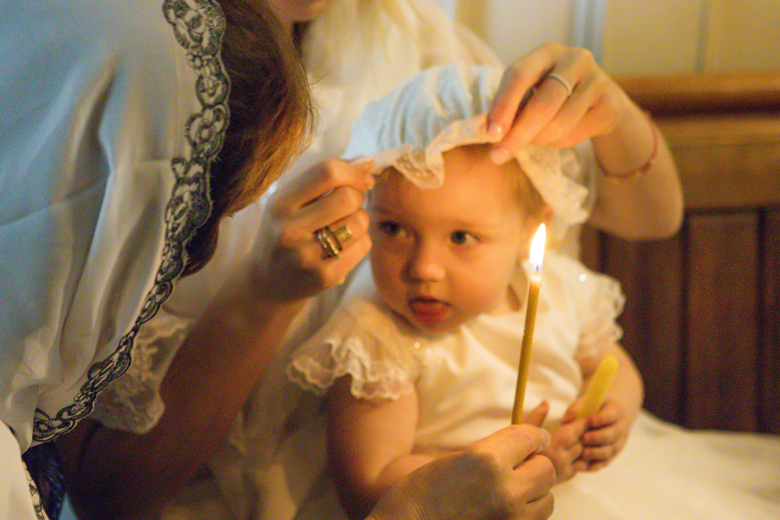 The sacrament of Milana Christening. Photographer Margarita Antonova in Naas, Co Kildare