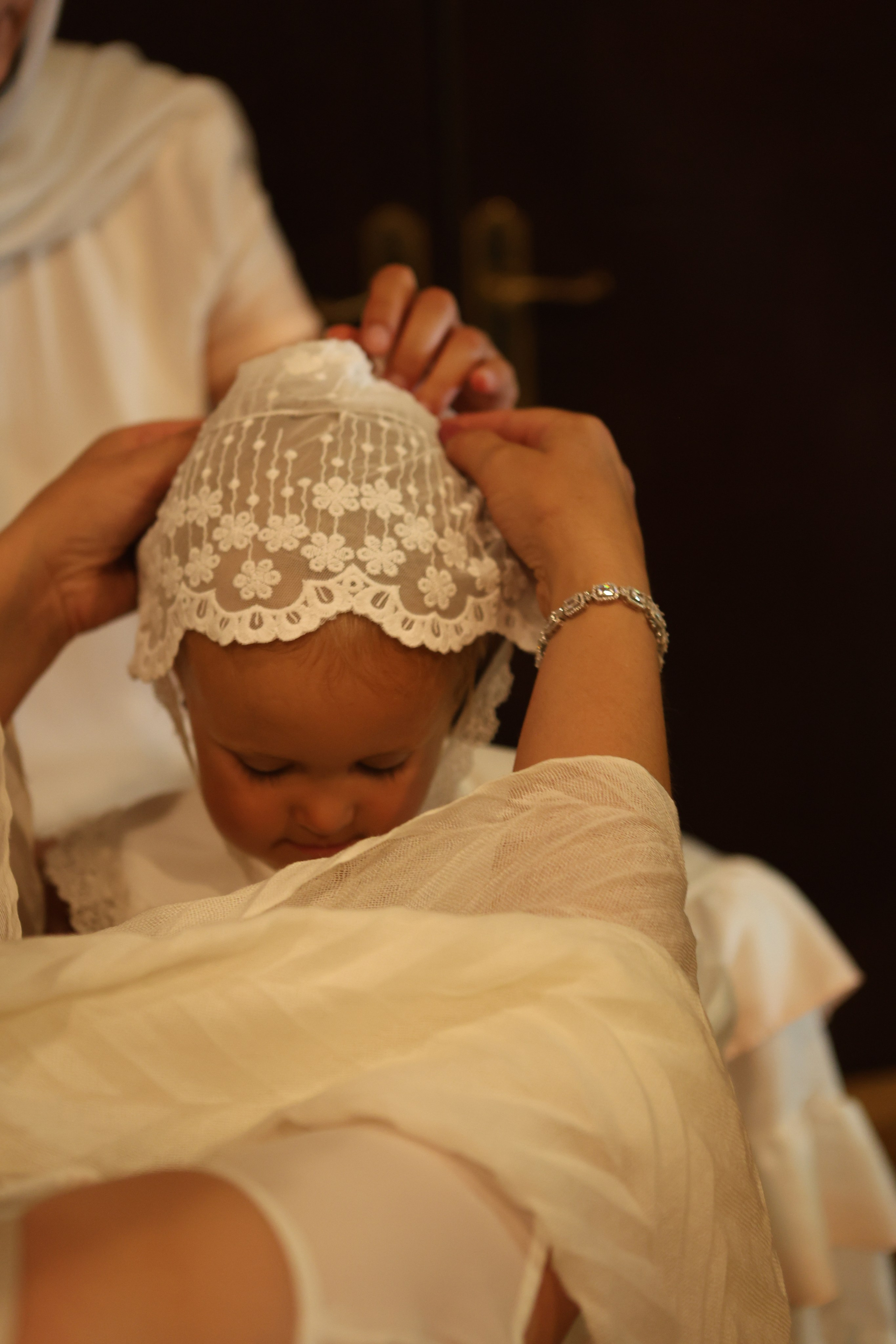 The sacrament of Gabriela Christening. Photographer Margarita Antonova in Naas, Co Kildare