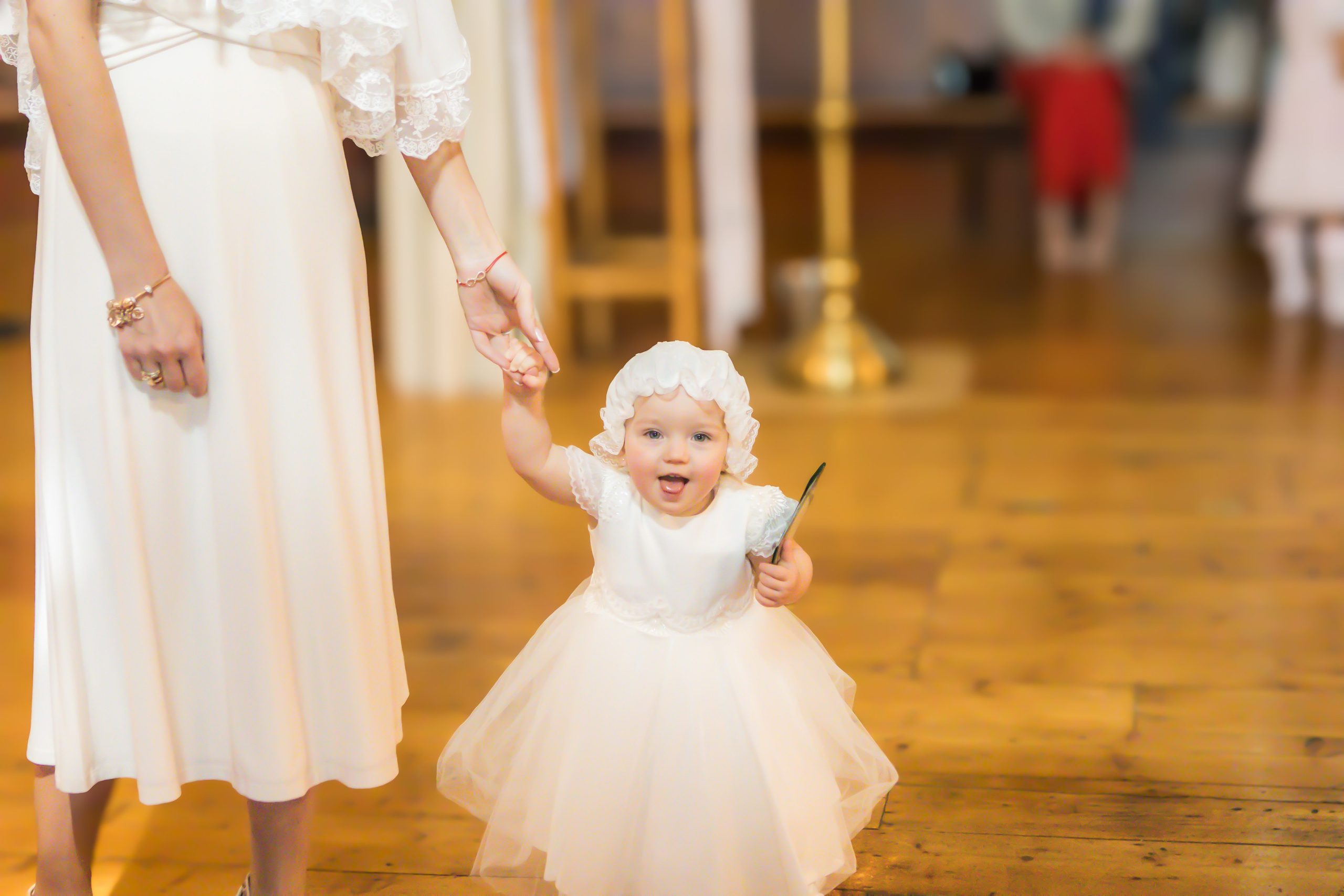 The sacrament of Milana Christening. Photographer Margarita Antonova in Naas, Co Kildare
