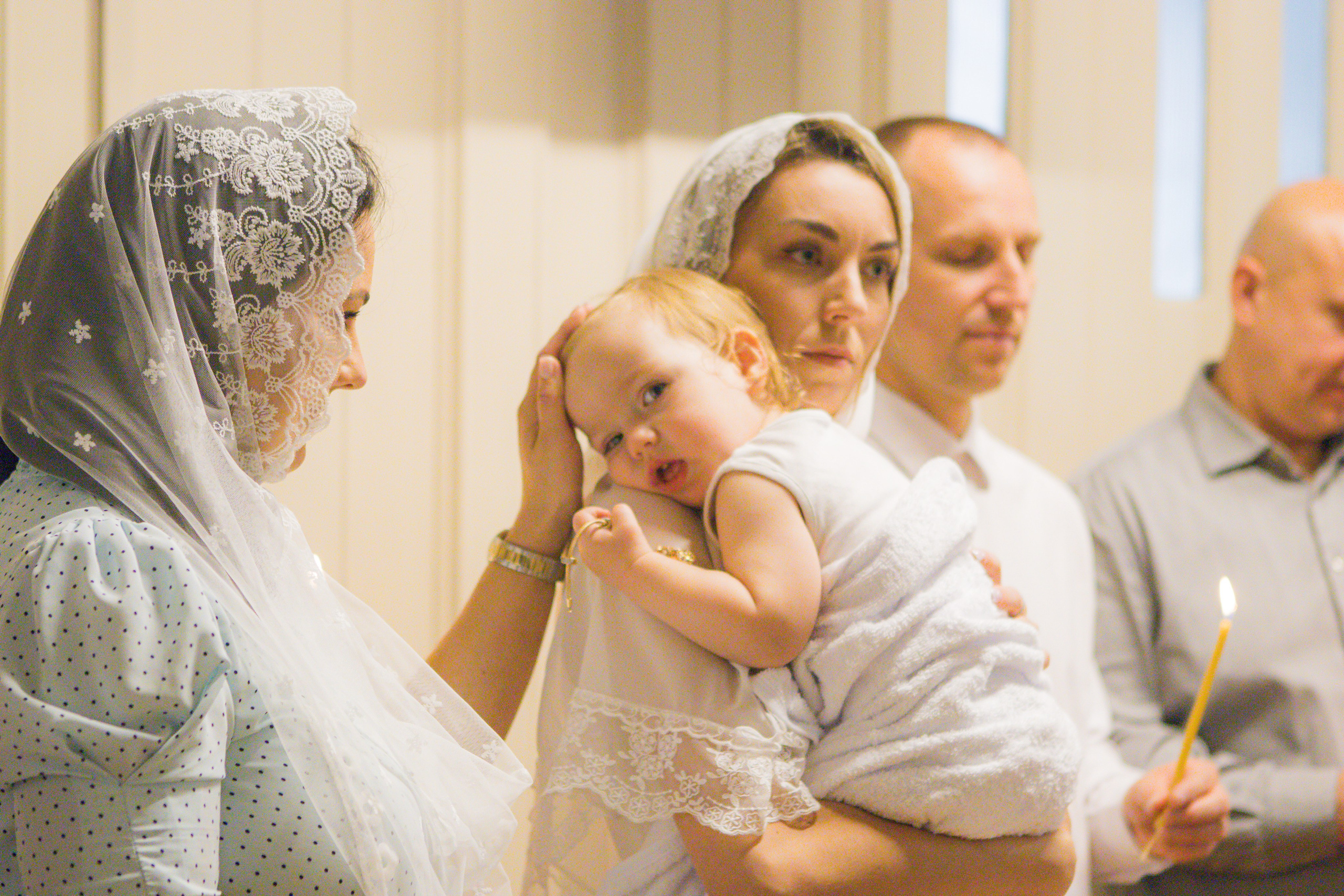 The sacrament of Milana Christening. Photographer Margarita Antonova in Naas, Co Kildare