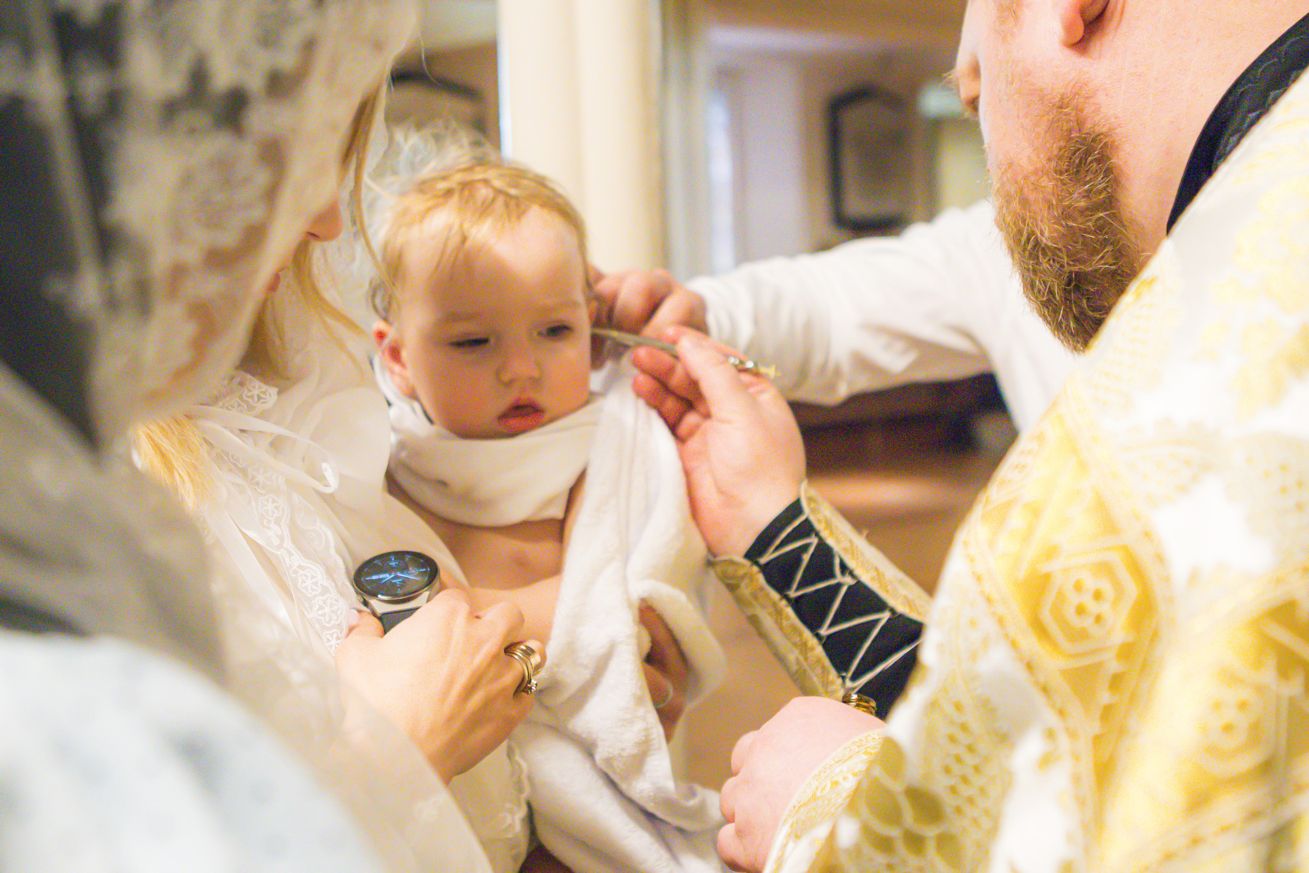 The sacrament of Milana Christening. Photographer Margarita Antonova in Naas, Co Kildare