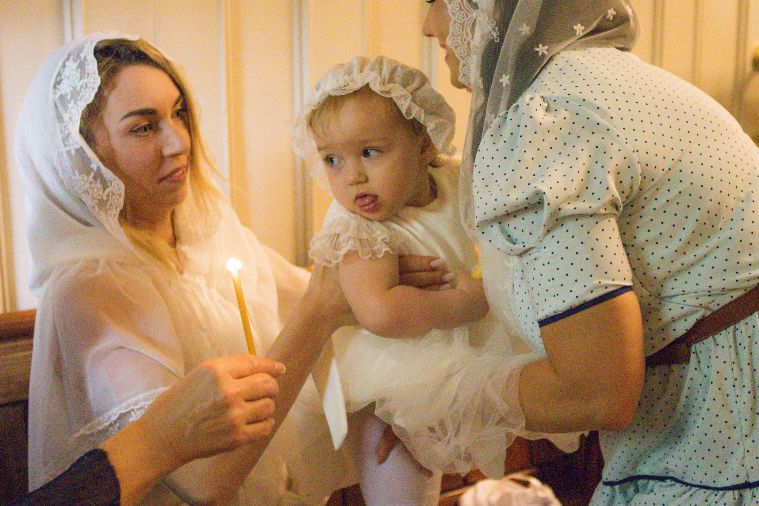 The sacrament of Milana Christening. Photographer Margarita Antonova in Naas, Co Kildare