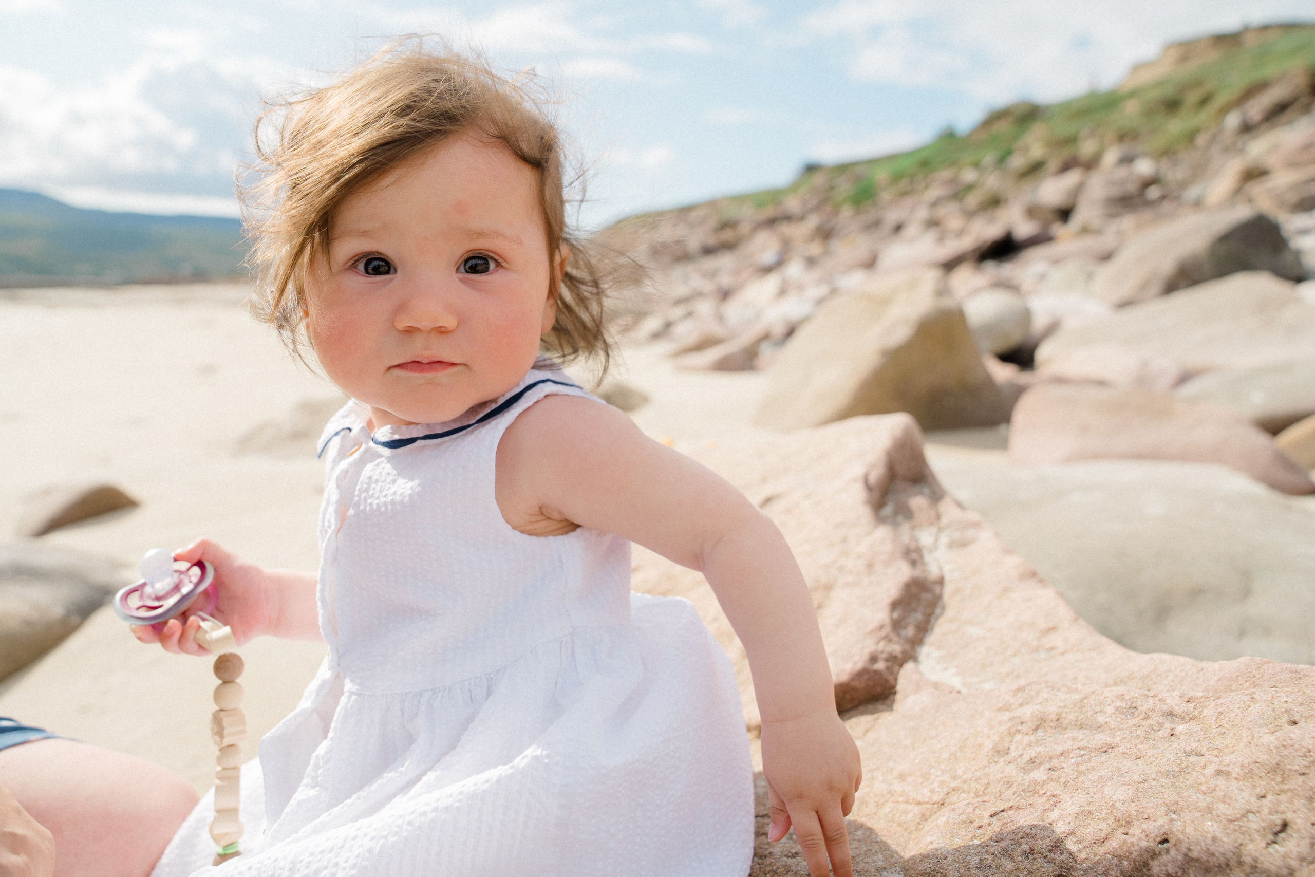 Darya and Mia at the ocean. Wedding and family photographer Ireland