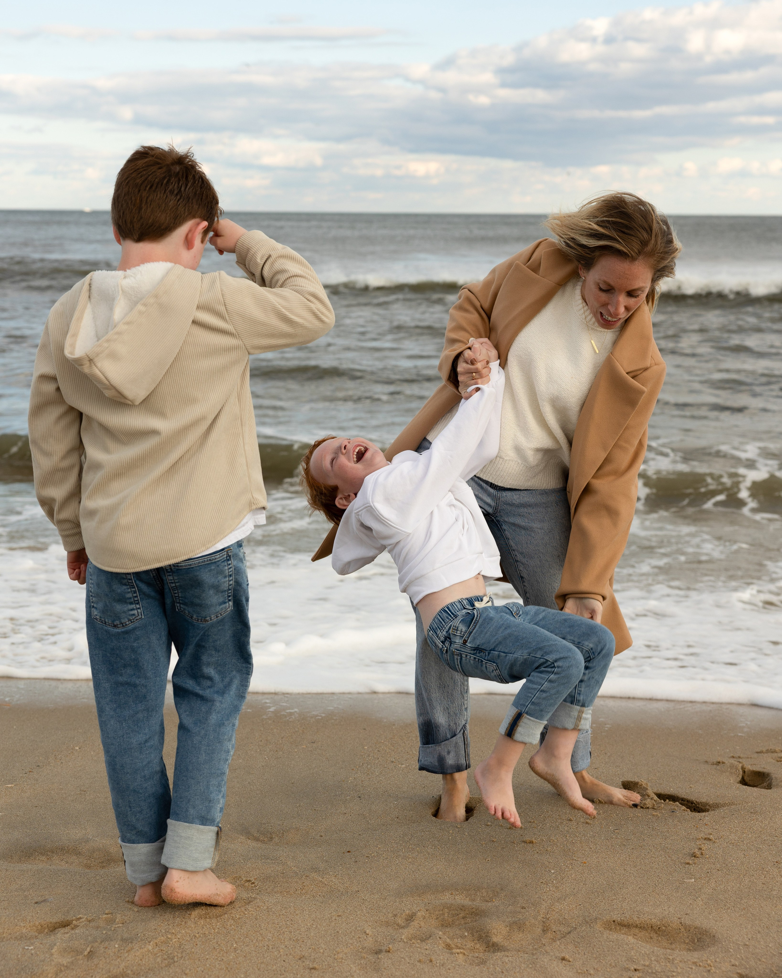 Sun, Sand, and Family Hugs. Family, lifestyle, and commercial photography in New York and New Jersey