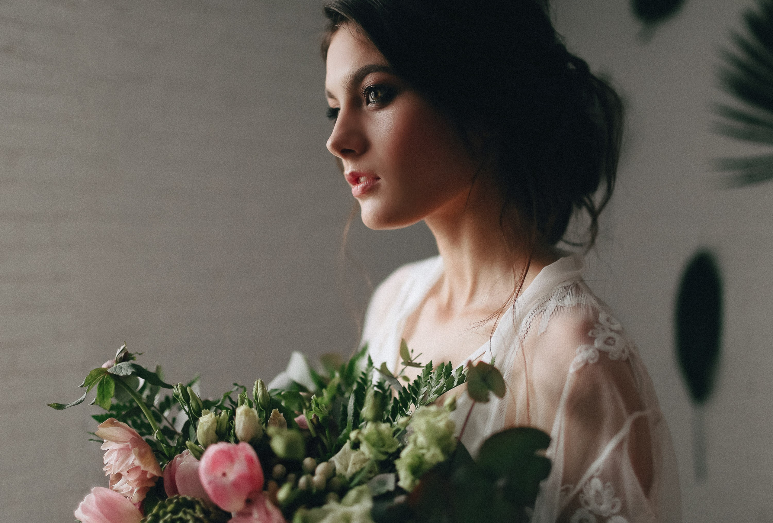 Bride holding bouquet, wedding preparation moment