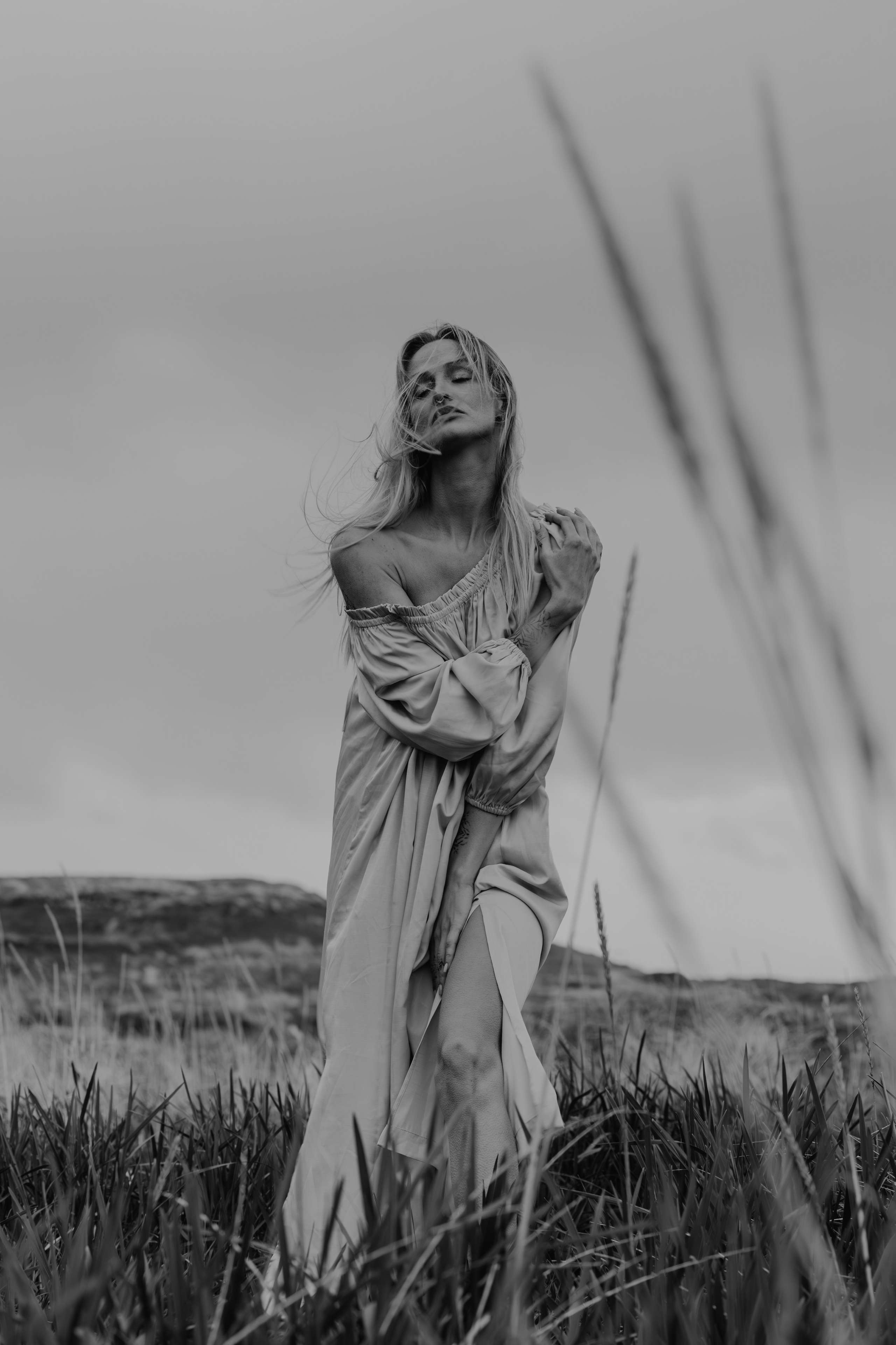 Feminine beauty meets Icelandic wilderness in a stunning outdoor portrait session.