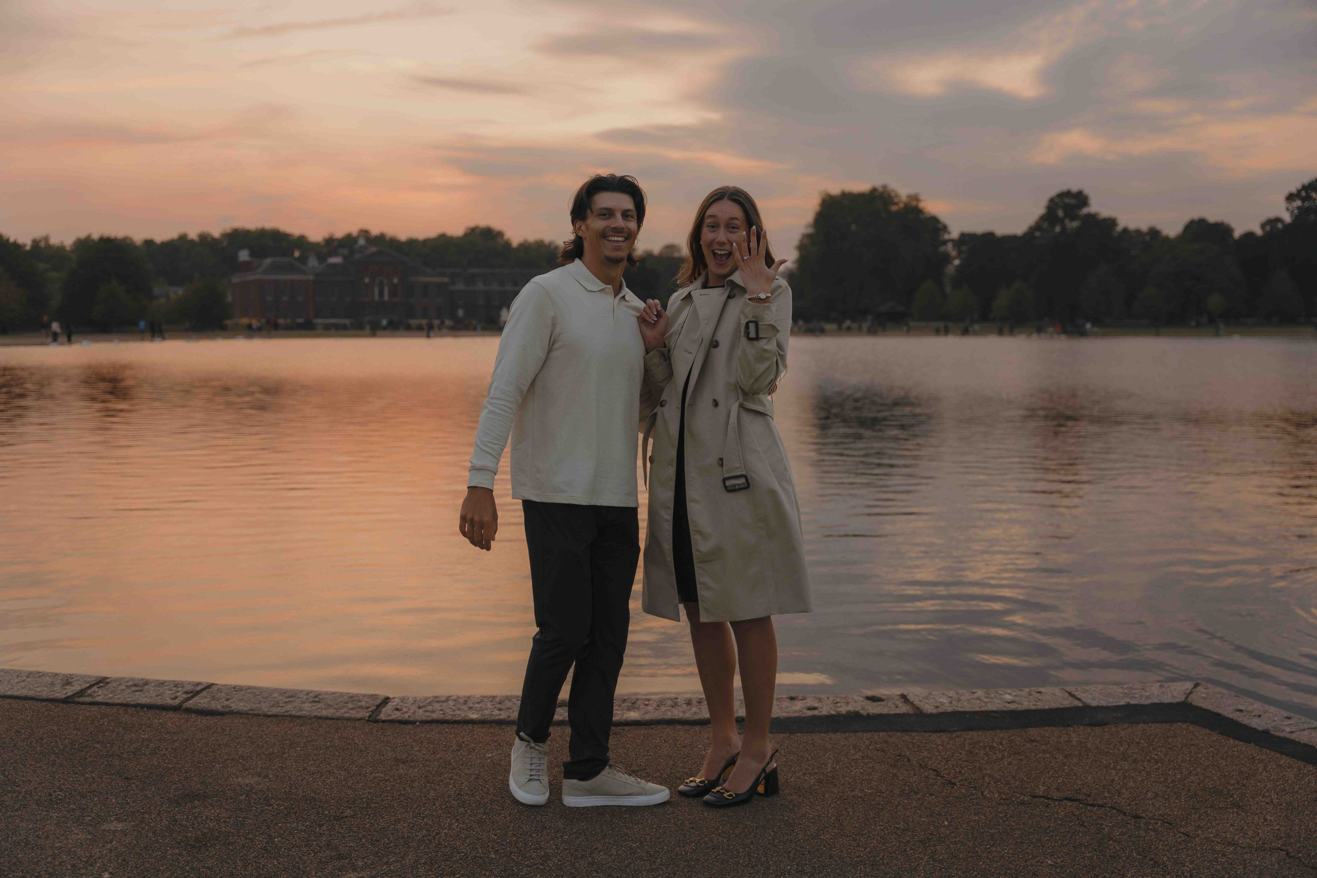 Emotional reaction during proposal Kensington Gardens London candid engagement