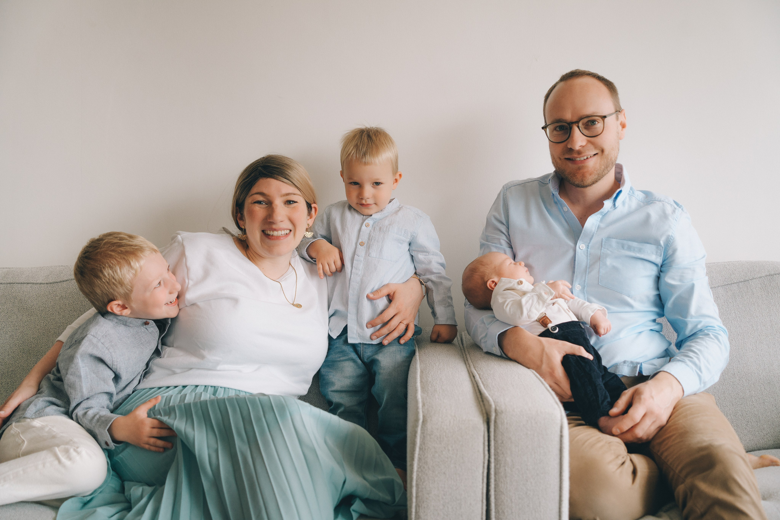 Lifestyle newborn photoshoot at home in Solihull, emotional and timeless family moments.