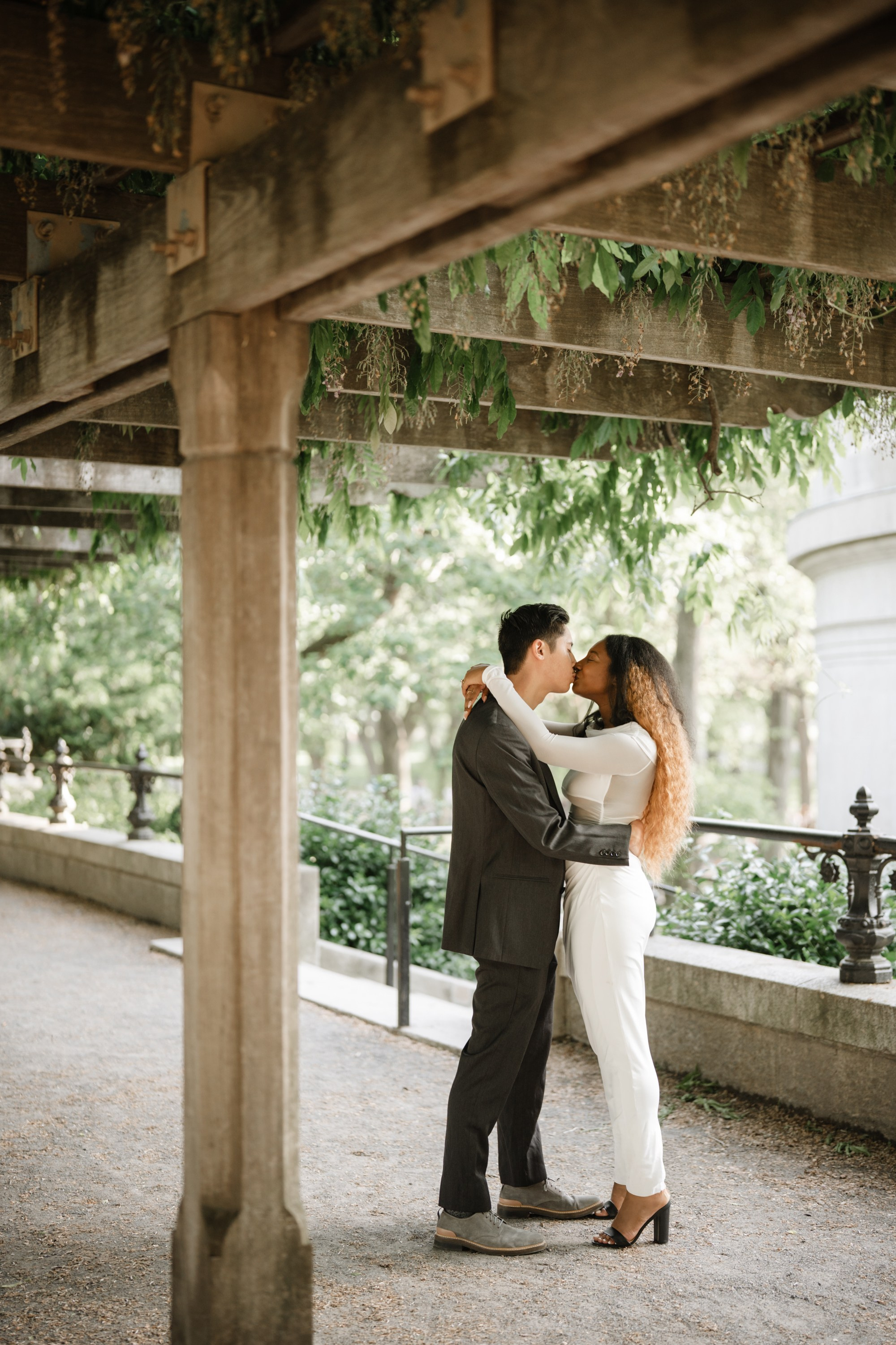 Engagement photo shoot in Central Park in spring. Portrait and wedding photographer in New York
