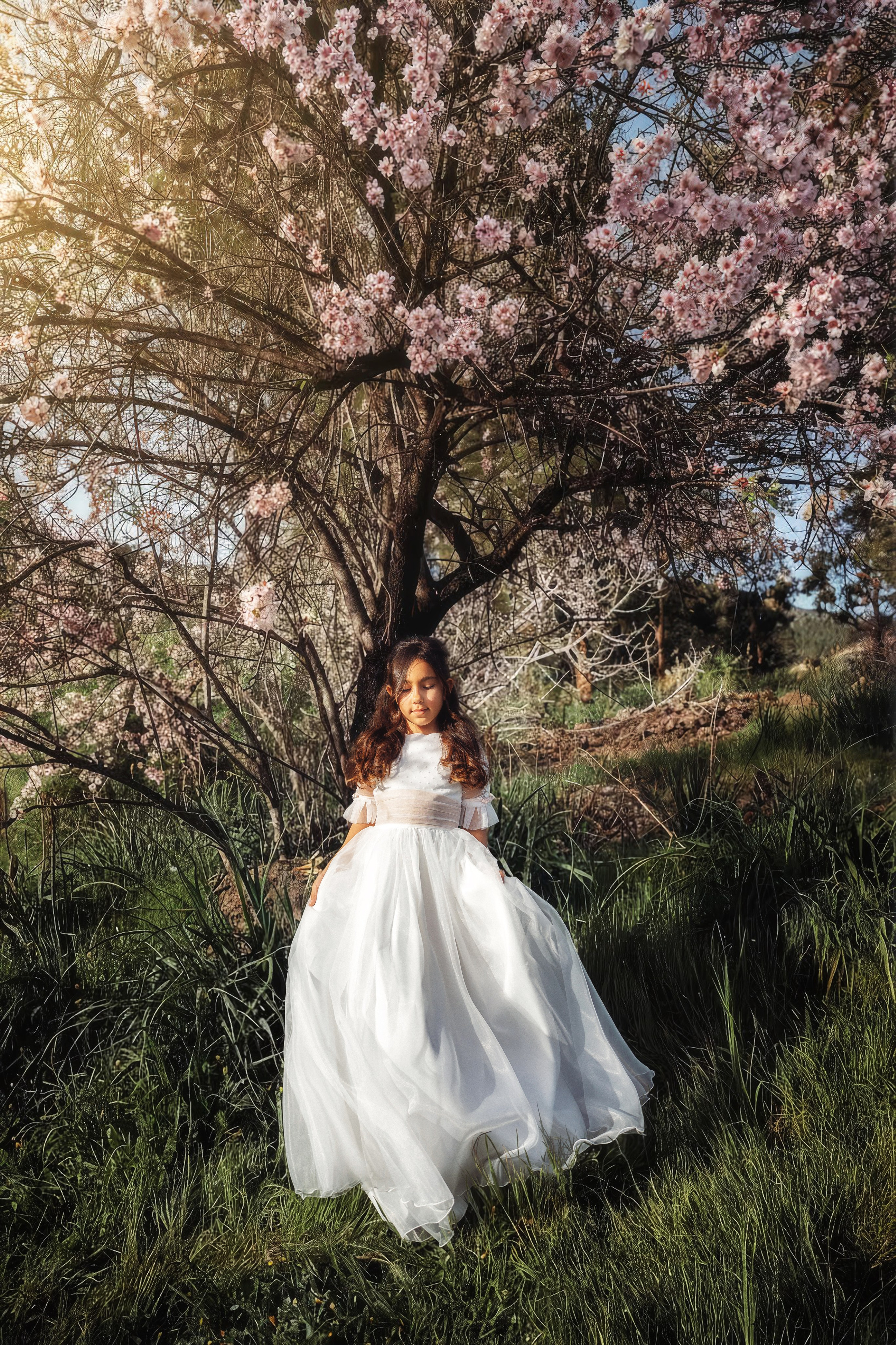 Fotos de comunión en Tenerife – Sesión con almendros en flor. Tania Bonnet | Fotógrafa profesional en Tenerife – Sesiones con vestidos voladores