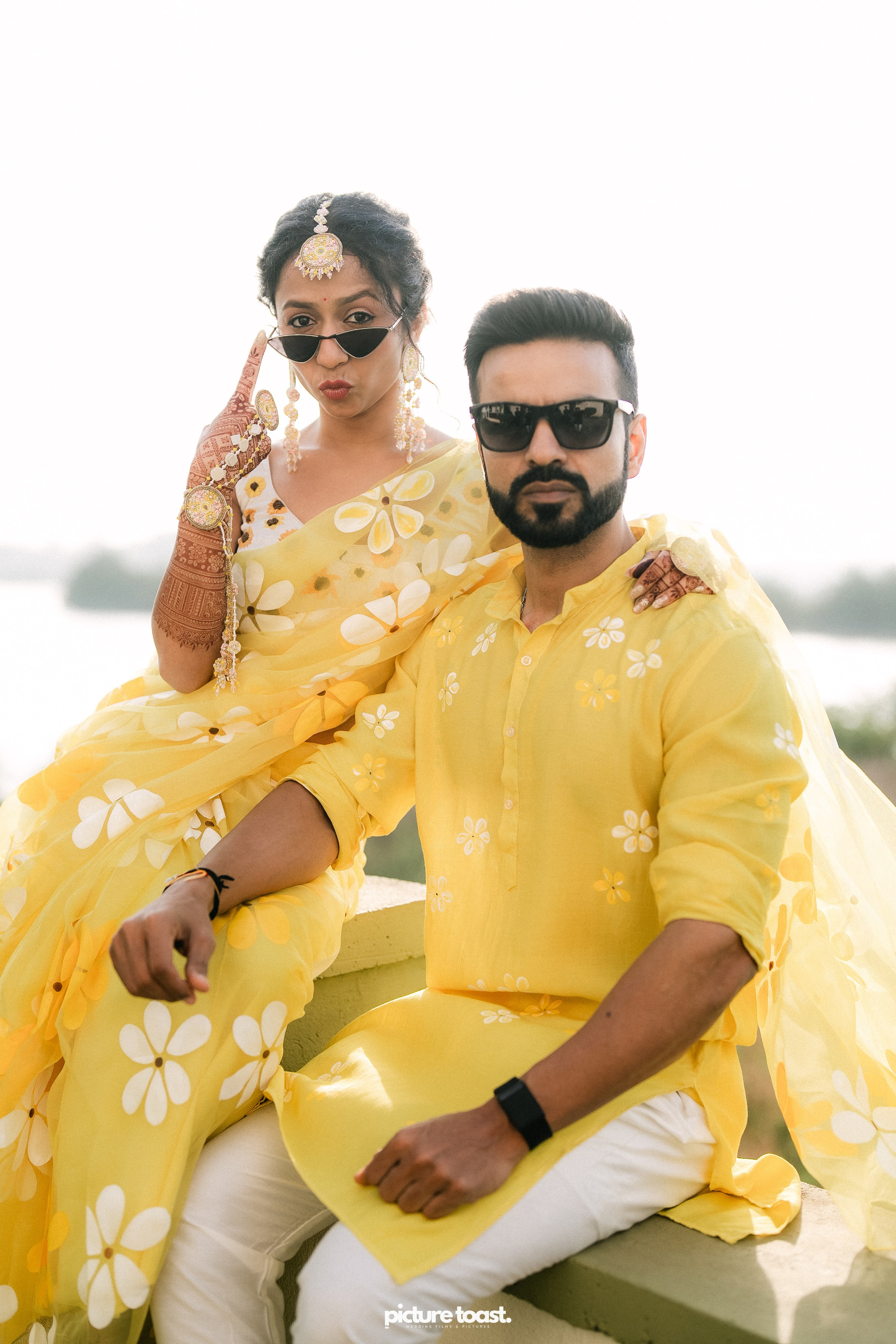 Haldi Hues Ft. Baebie & Goyal. Fine art Wedding Photographers in India & Canada