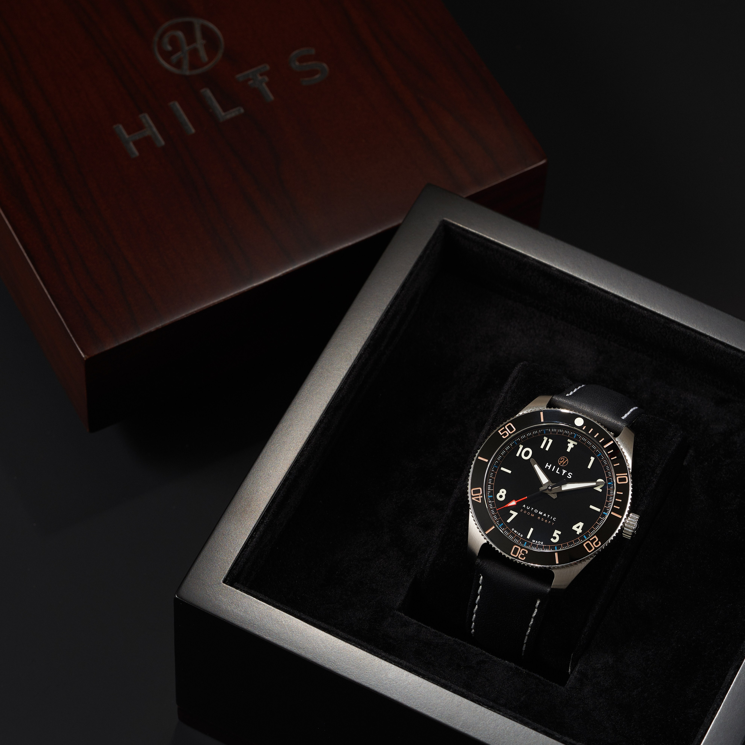 Watch presented in its branded wooden box