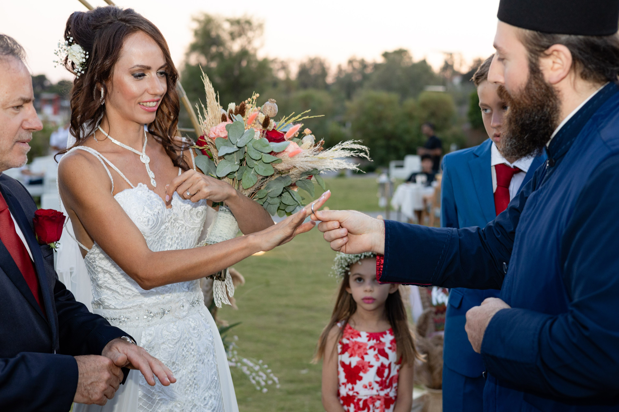Bride exchanging rings during the wedding ceremony