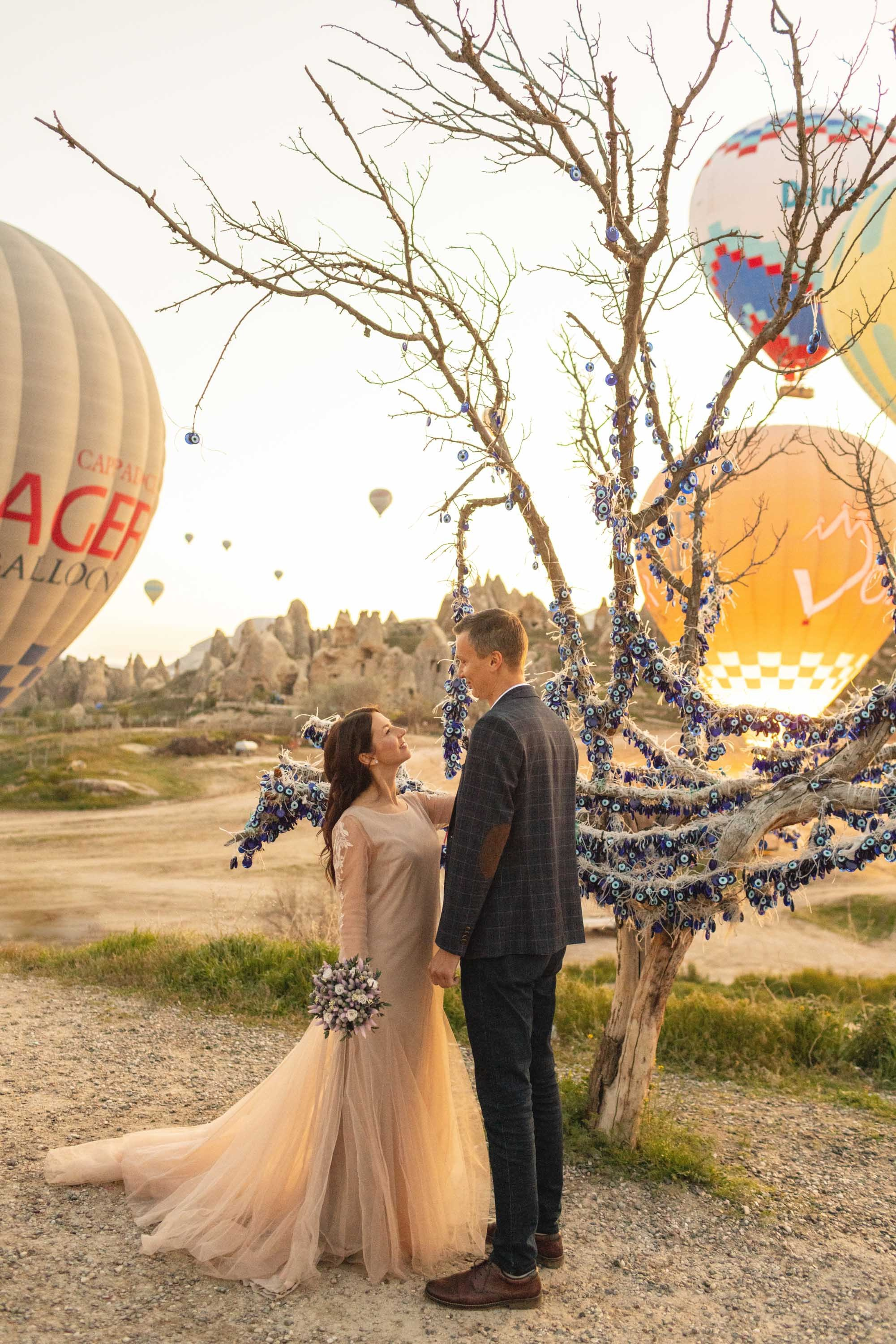 Magical Wedding Photoshoot in Cappadocia: Balloons, Caves, and Valleys. Julia Ganch I Fashion Wedding Photography I Cappadocia Turkey
