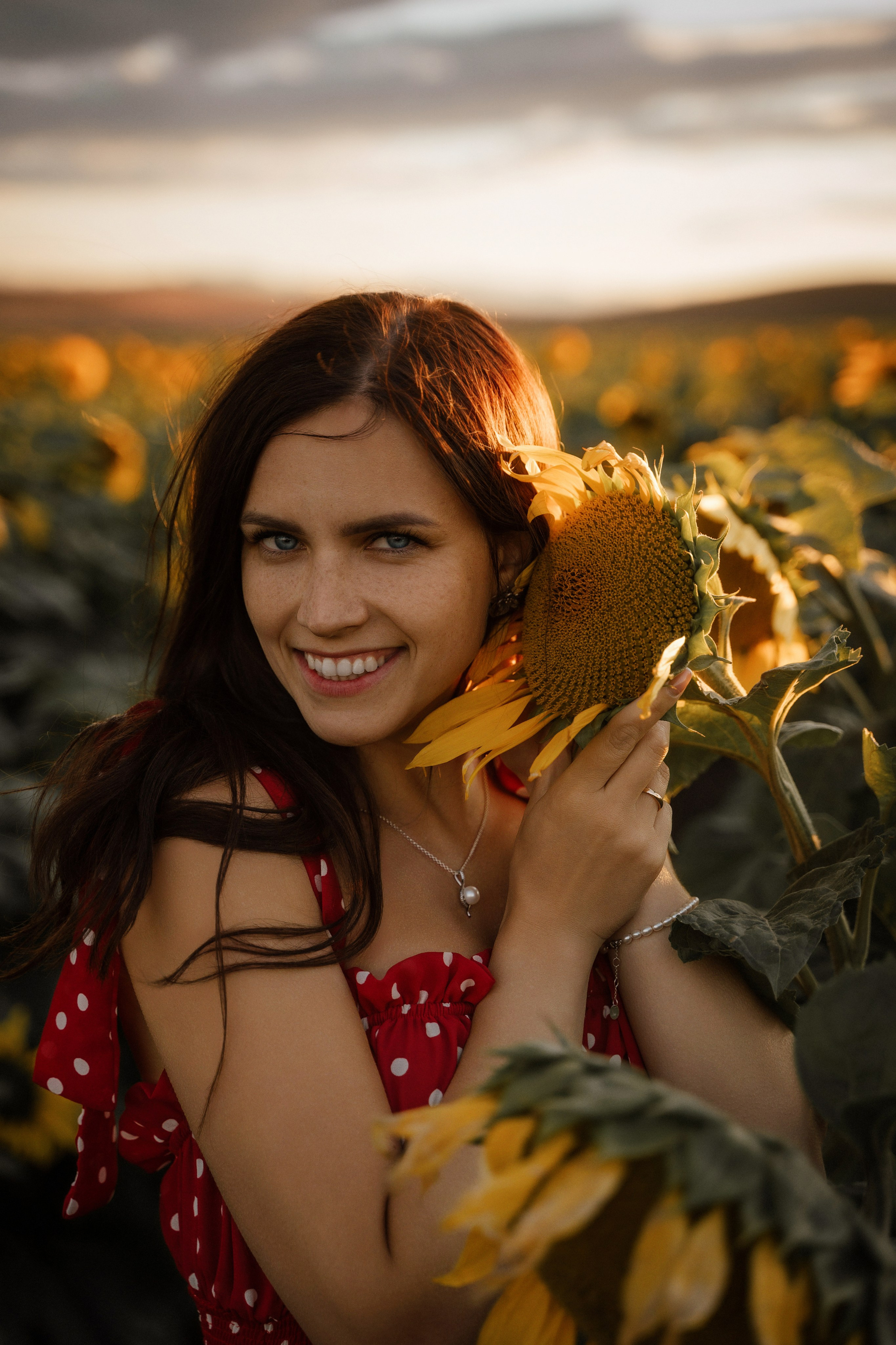 Marbella portrait photography of beautiful female model at sunset in sunflower field